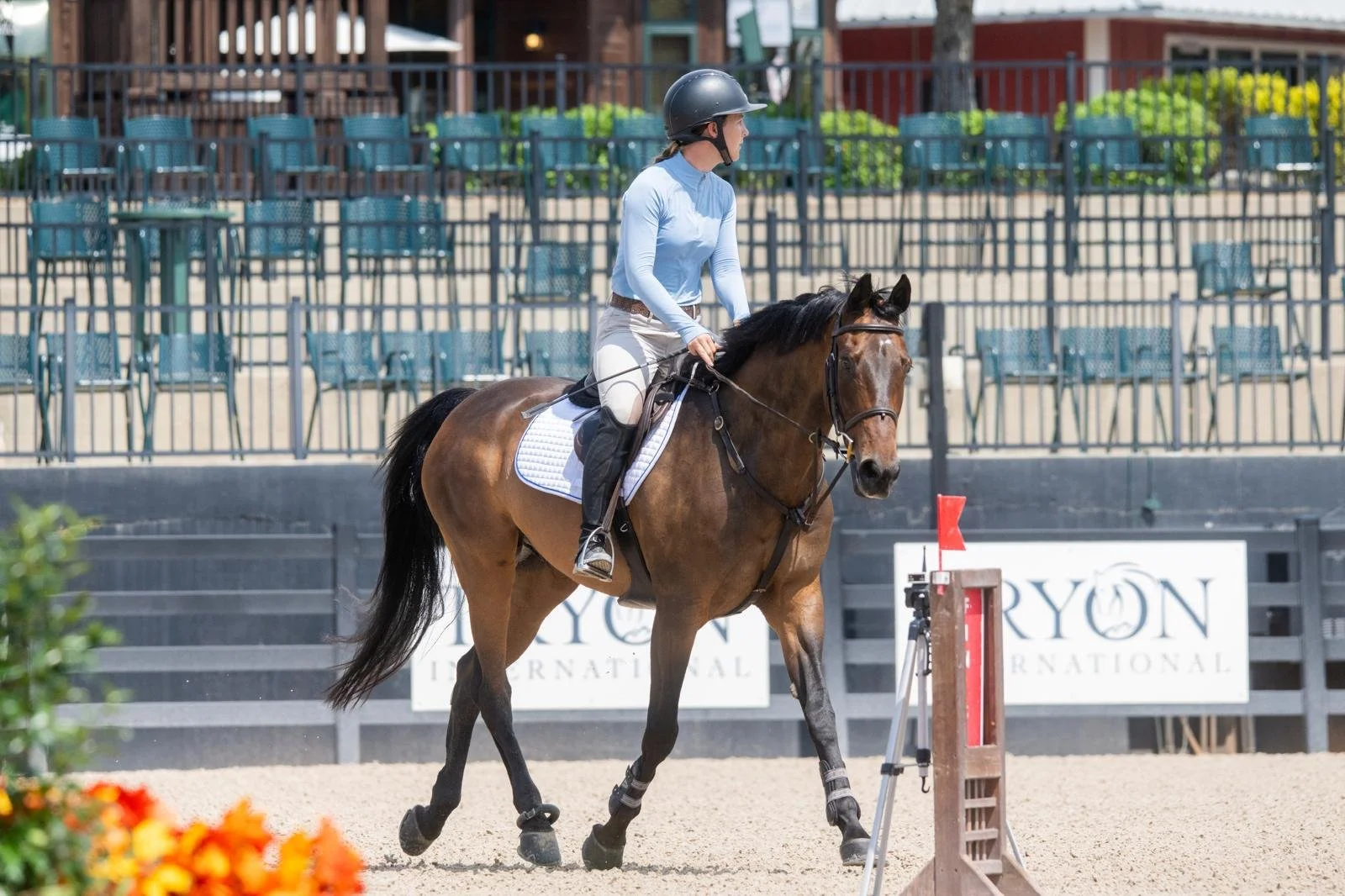 Bryn Sadler trotting Cezarro in the ring at Tryon International Equestrian Center in North Carolina