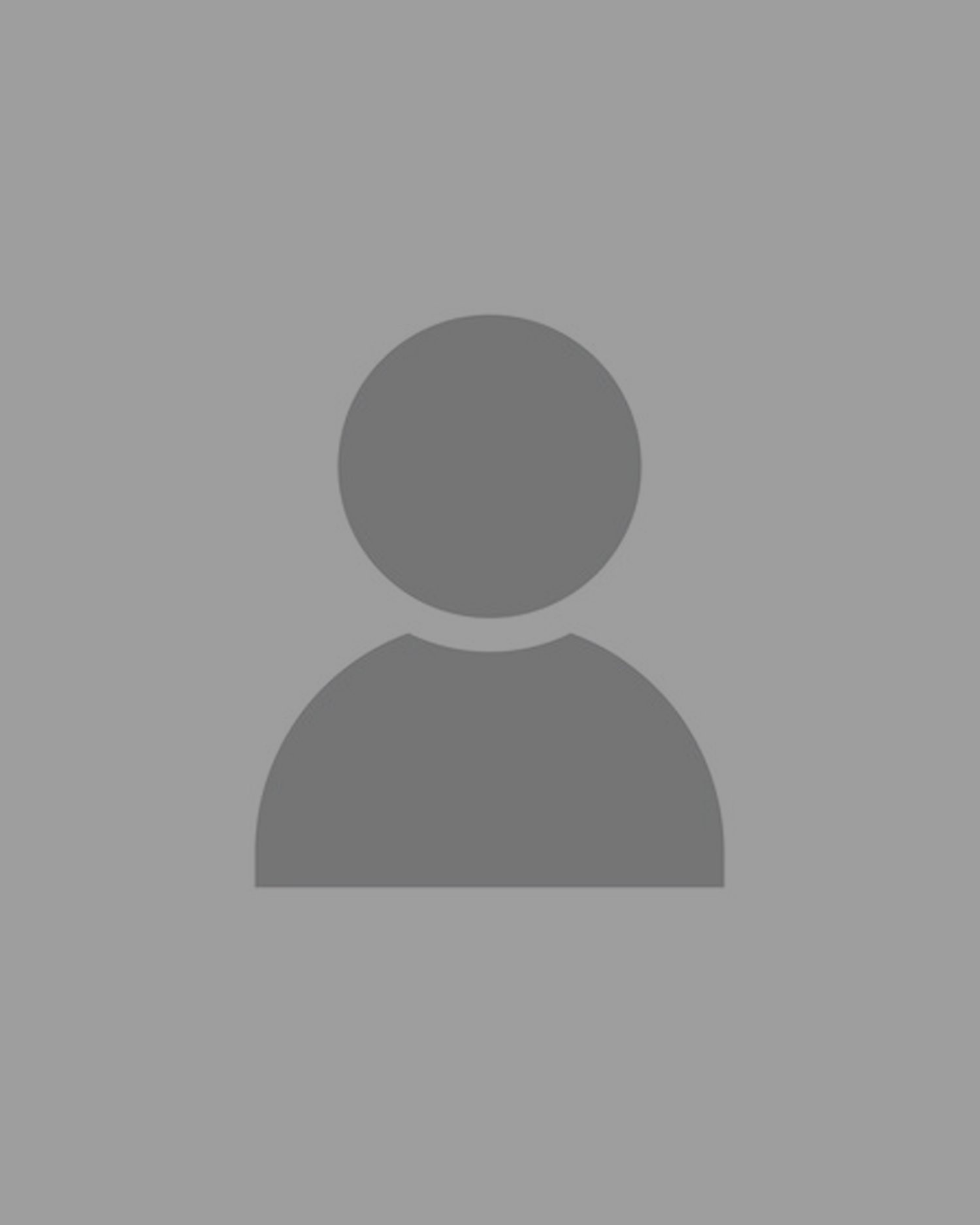 Grayscale placeholder image of a user avatar icon with a circular head and a semi-circular shoulders.