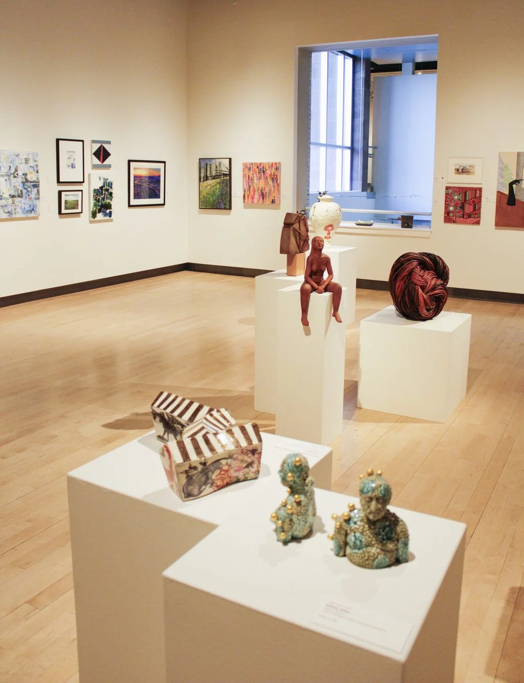 3-D Art and 2-D Art from Missoula Art Museum's Fan the Flame Art Auction on display in the Carnegie Gallery.