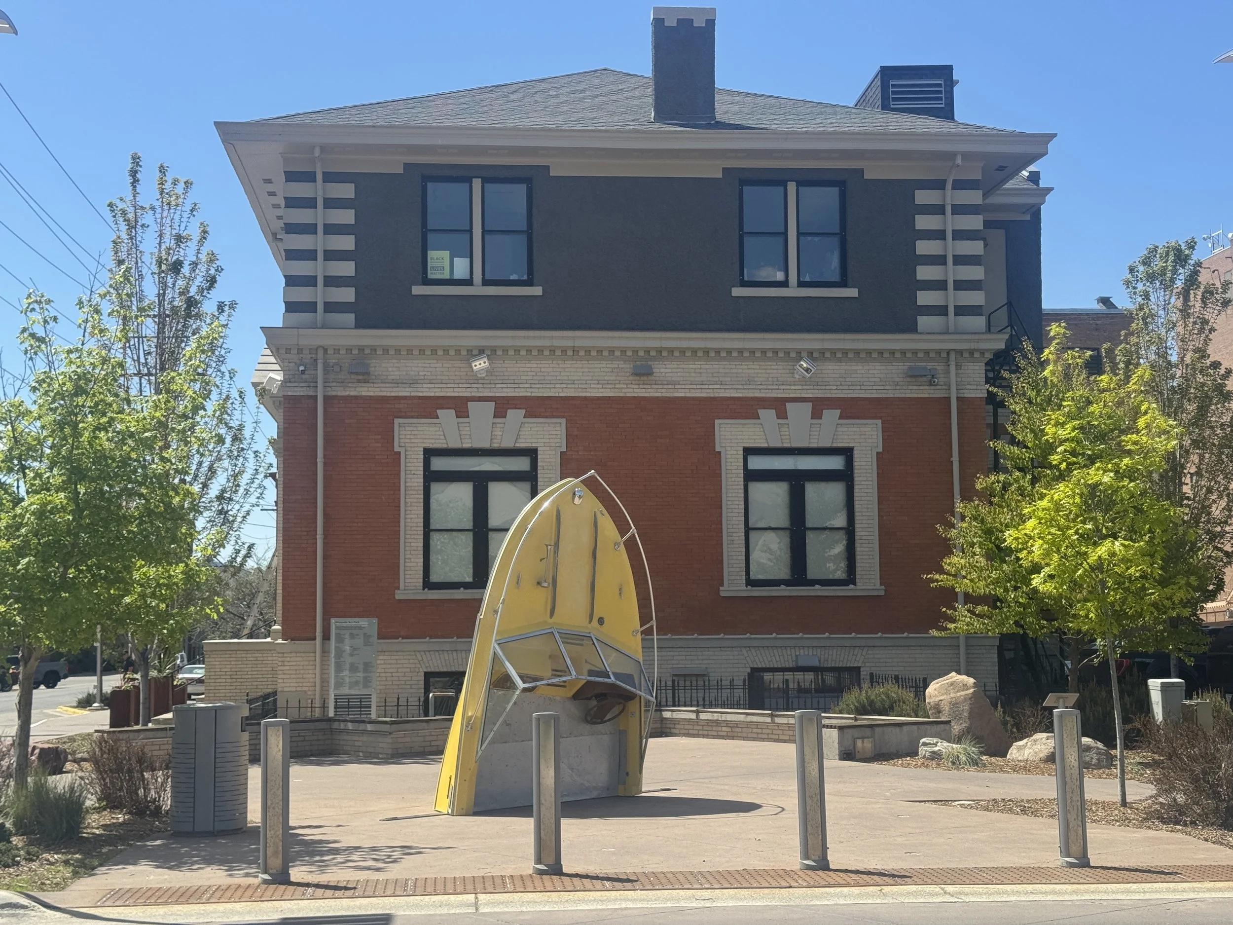 Karl Schiewisow's "Yellow Boat" sculpture on display in Missoula Art Museum's Art Park, Summer 2025.