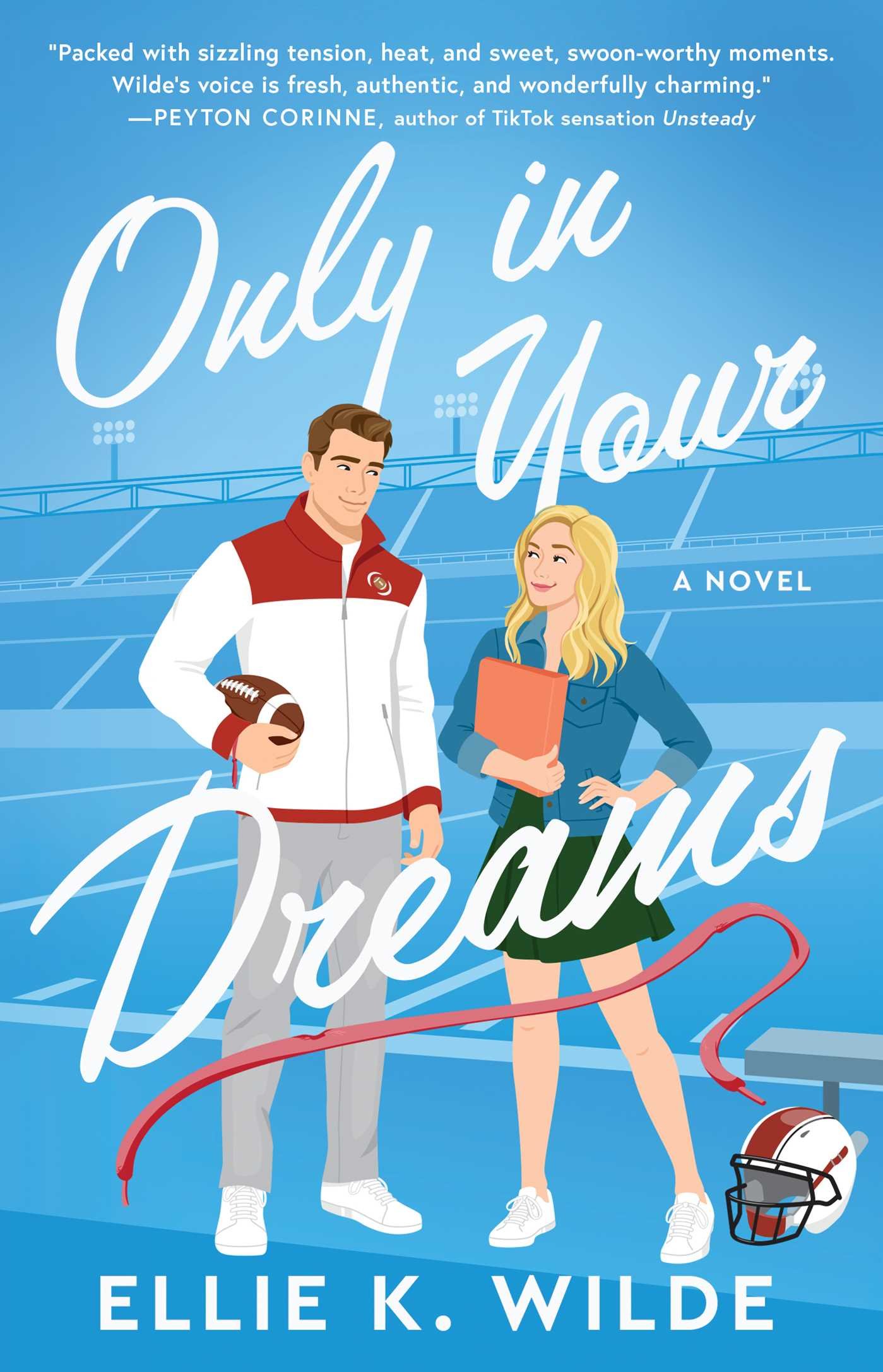 Paperback cover of ONLY IN YOUR DREAMS by Ellie K. Wilde. Illustration of a football coach and a petite blonde woman holding a binder in front of a blue background of a football field, adorned with a football helmet and red shoelace.