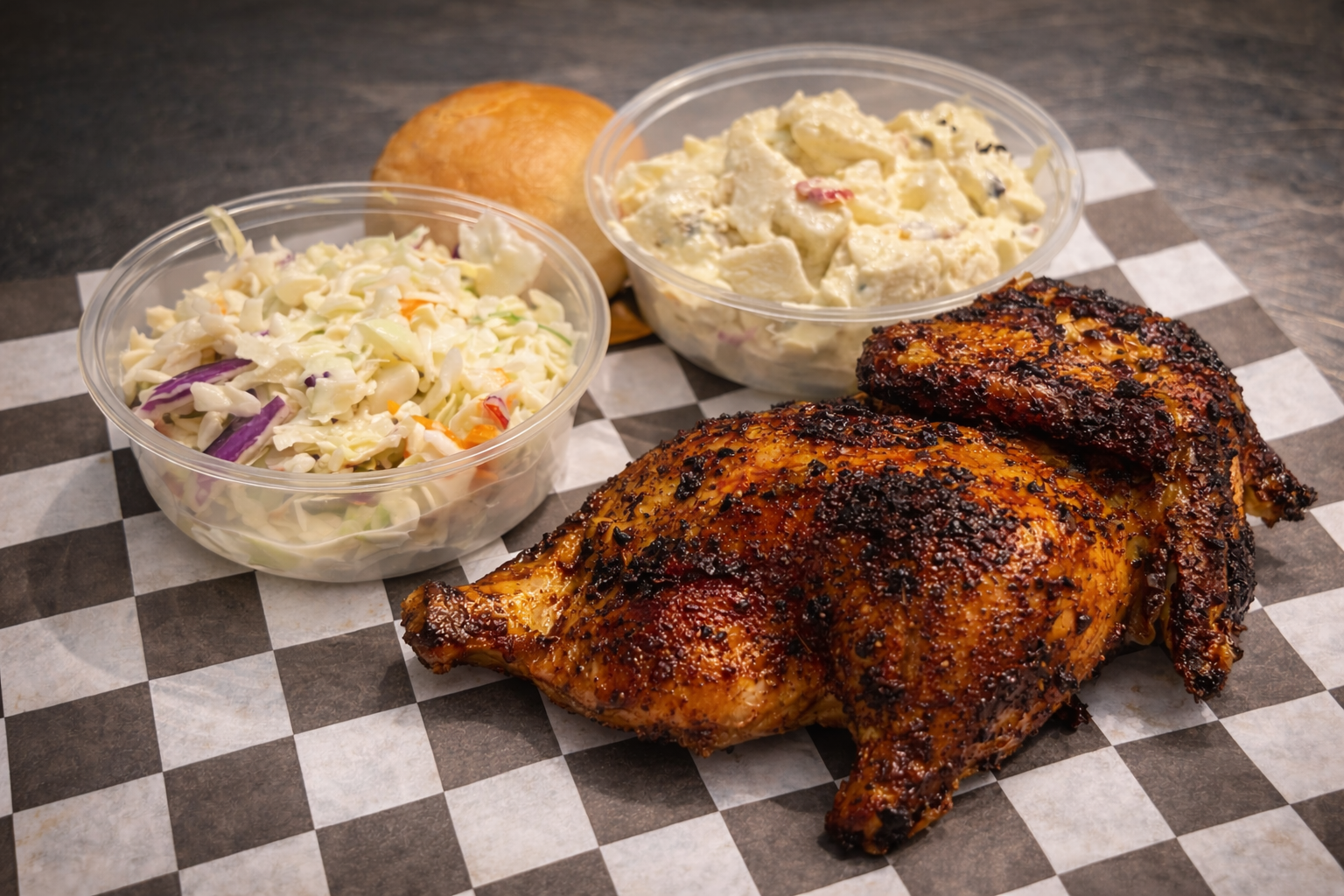 Slow roasted half rotisserie chicken with two sides, served hot and ready in Lockport NY