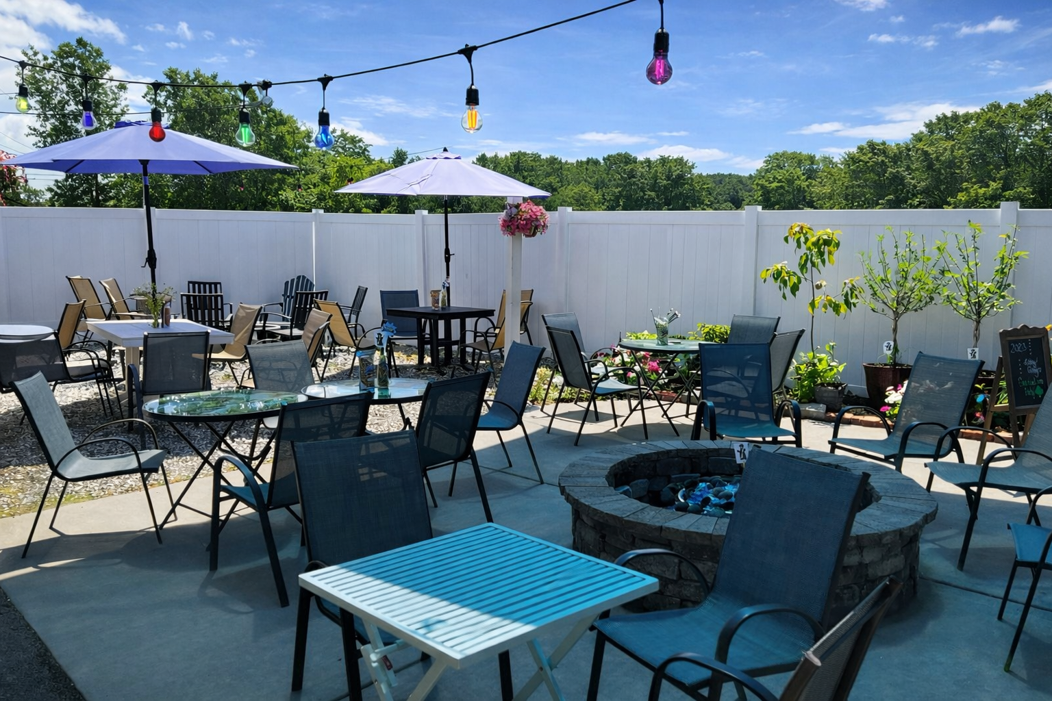 Outdoor patio seating at Short Street Patio Bar in Lockport NY, a relaxed spot for food and drinks