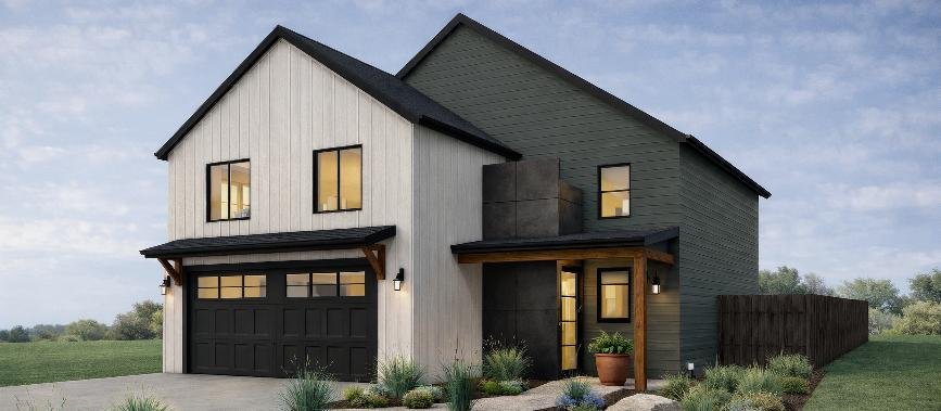 Two-story home exterior with attached garage and front porch.