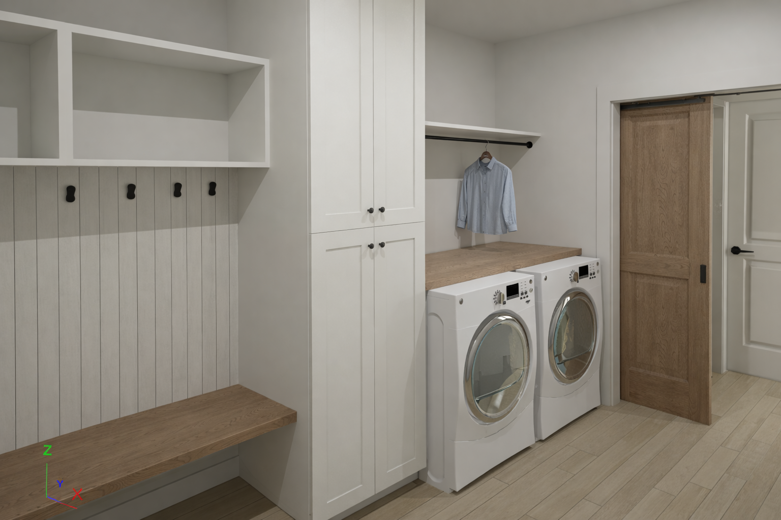 Laundry room with washer, dryer, and storage cabinetry.
