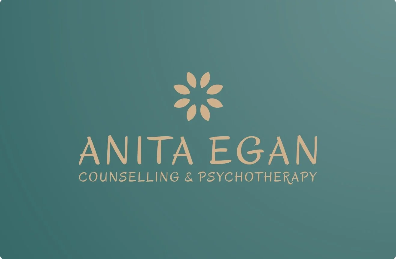 Gold flower logo and Text on a teal background for Anita Egan Counselling and Psychotherapy