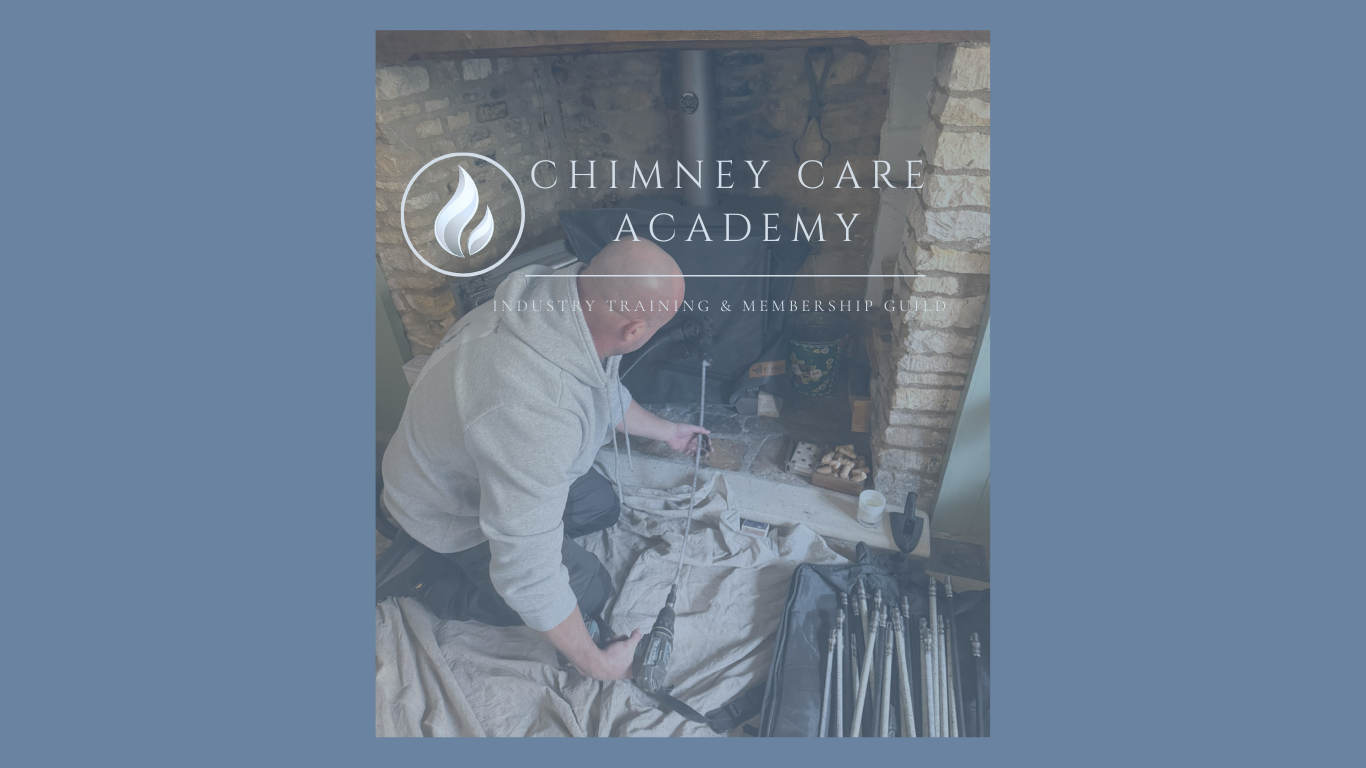 Chimney Academy Care Expert showing how Chimney Care Academy training carries out its training to an exceptional standard. Chimney sweep and care expert wearing full PPE carrying out a training session.