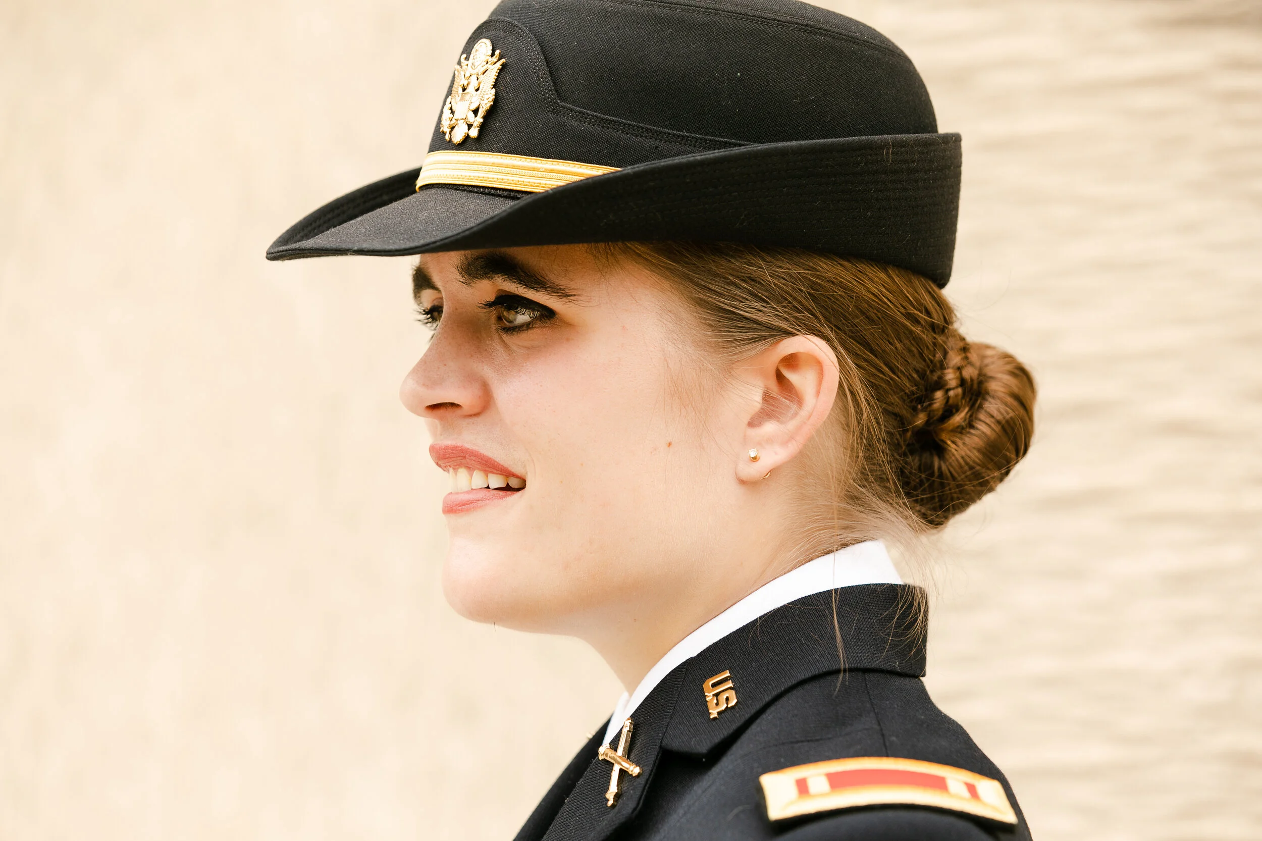 side profile portrait of a highly decorated female military officer