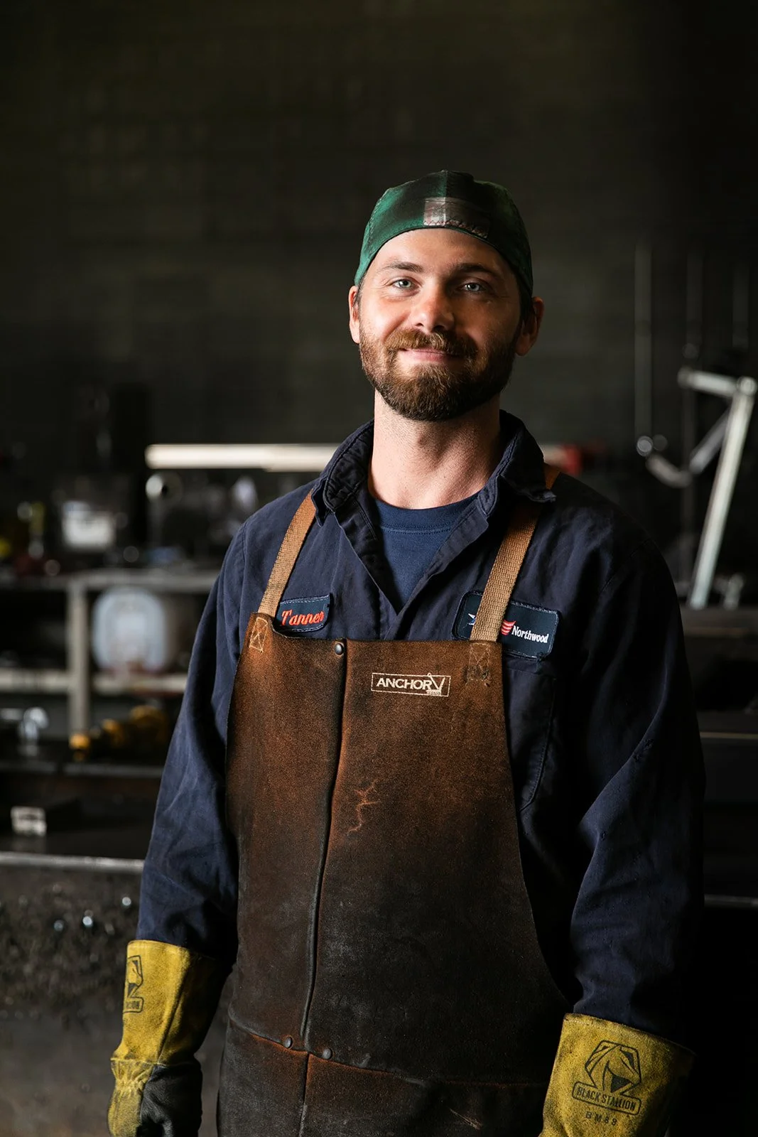 machine shop operator gets an environmental portrait for his company bio