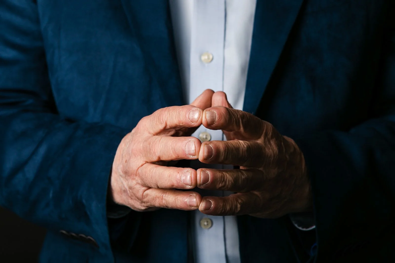 Close-up shot of an elderly man's hands