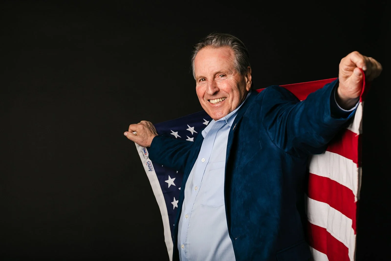 A man holds his U.S. flag from the Vietnam War