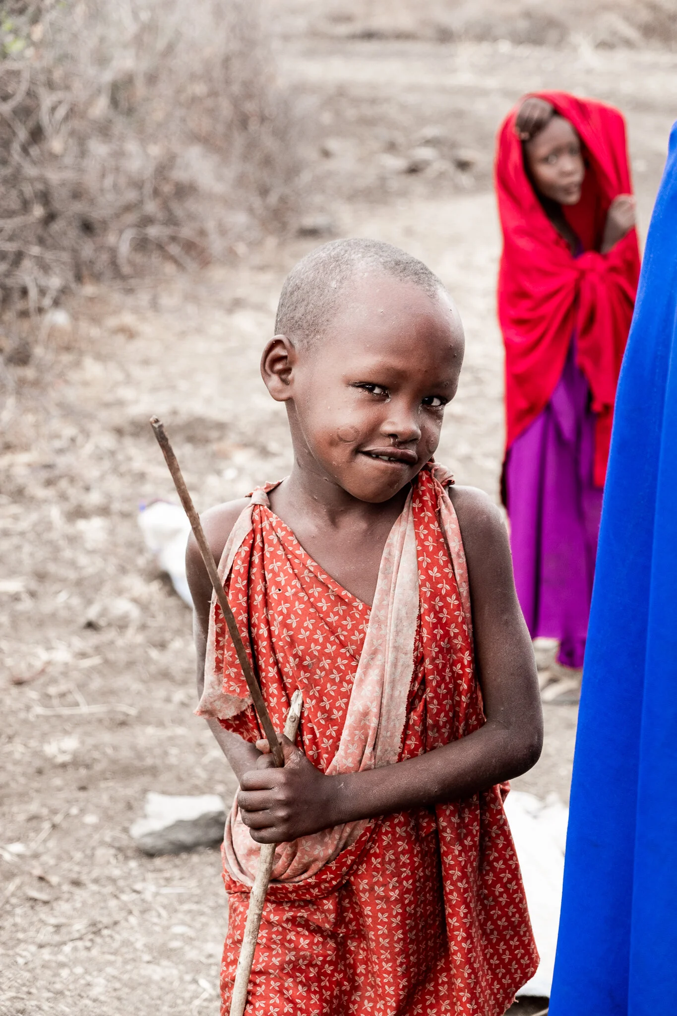 A playful maasai child shows the daily live of the tribe