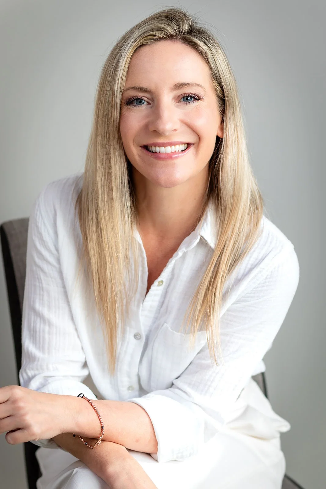 A close-up of Christina Campbell, a smiling real estate agent with Keller Williams Elevate, exuding approachability and professionalism.