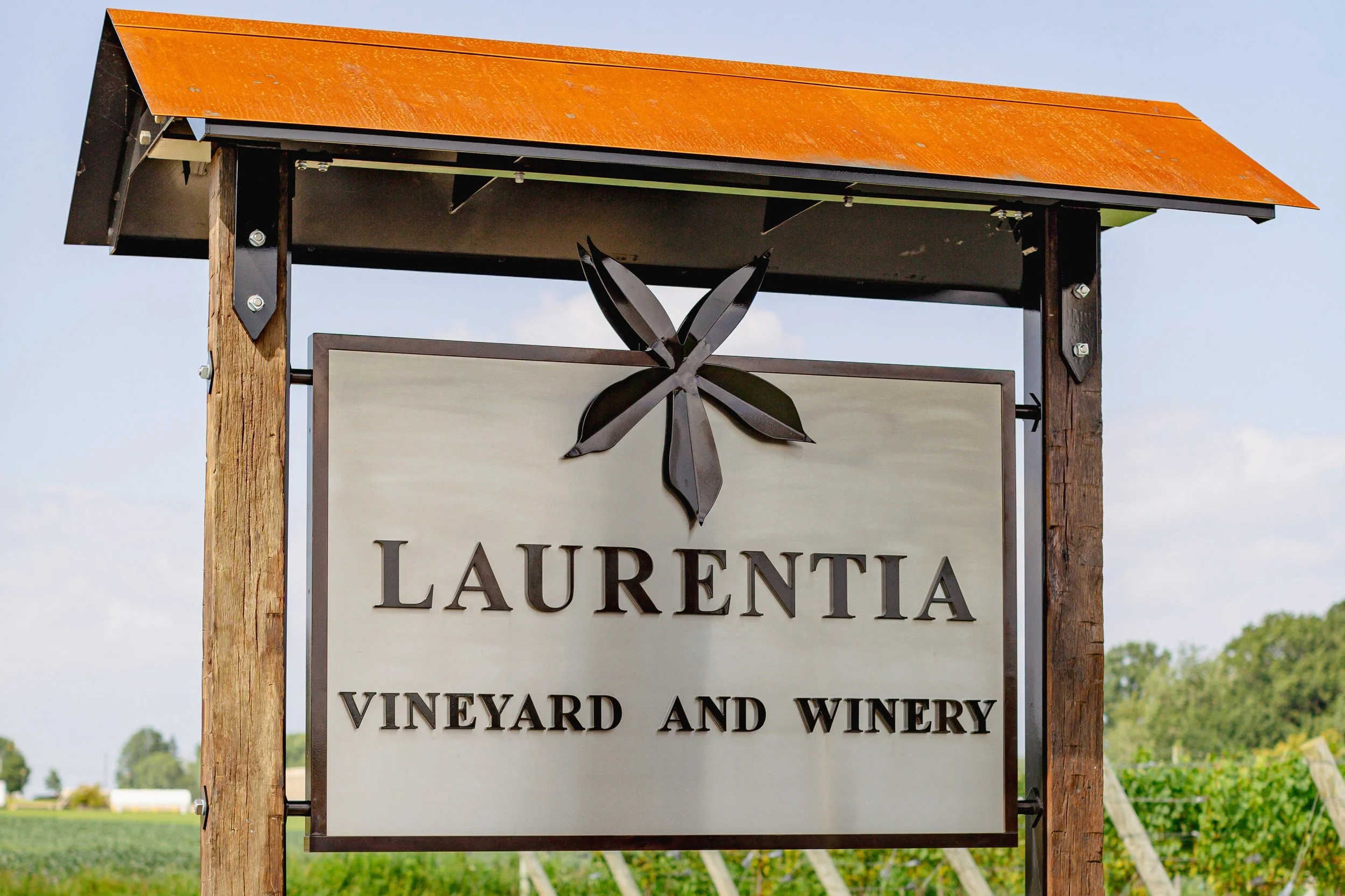 The Laurentia Vineyard and Winery sign, welcoming guests to the estate.