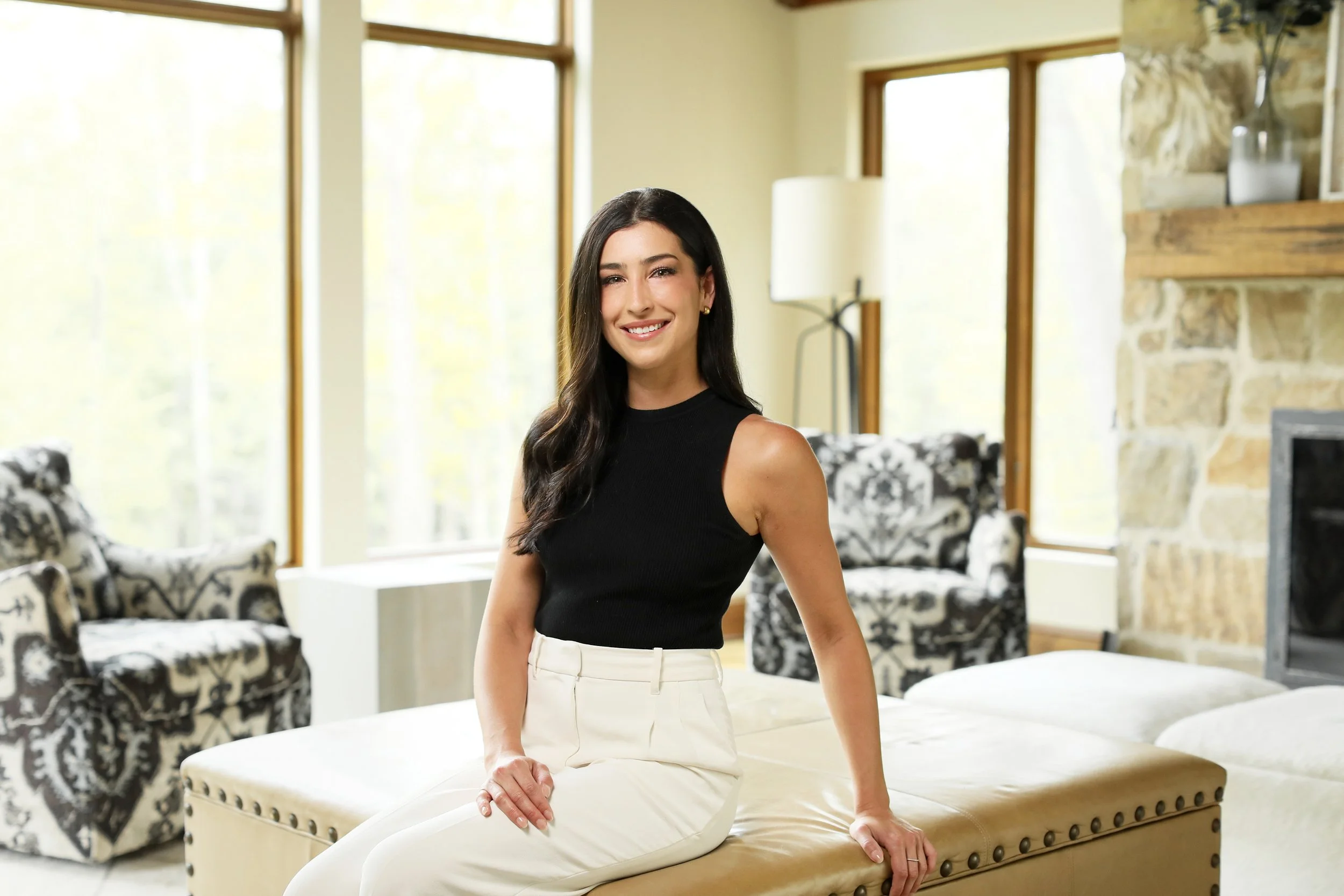 Real estate agent posing in a modern living room
