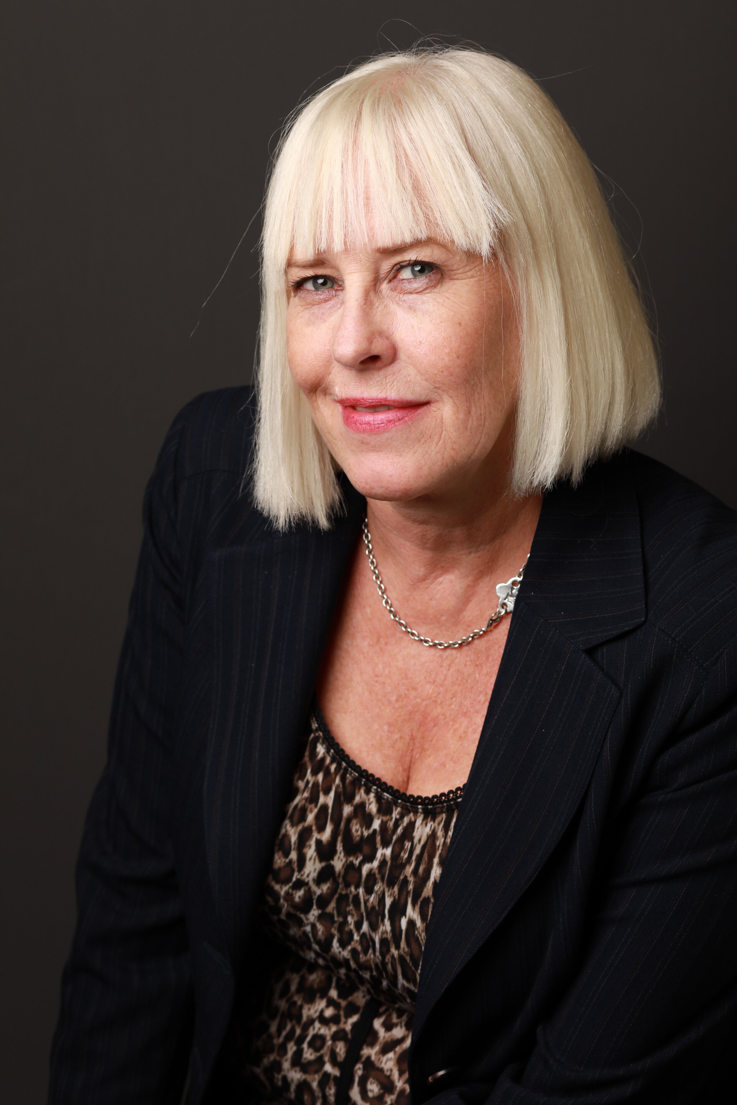 Women should use flattering necklines to get a good headshot