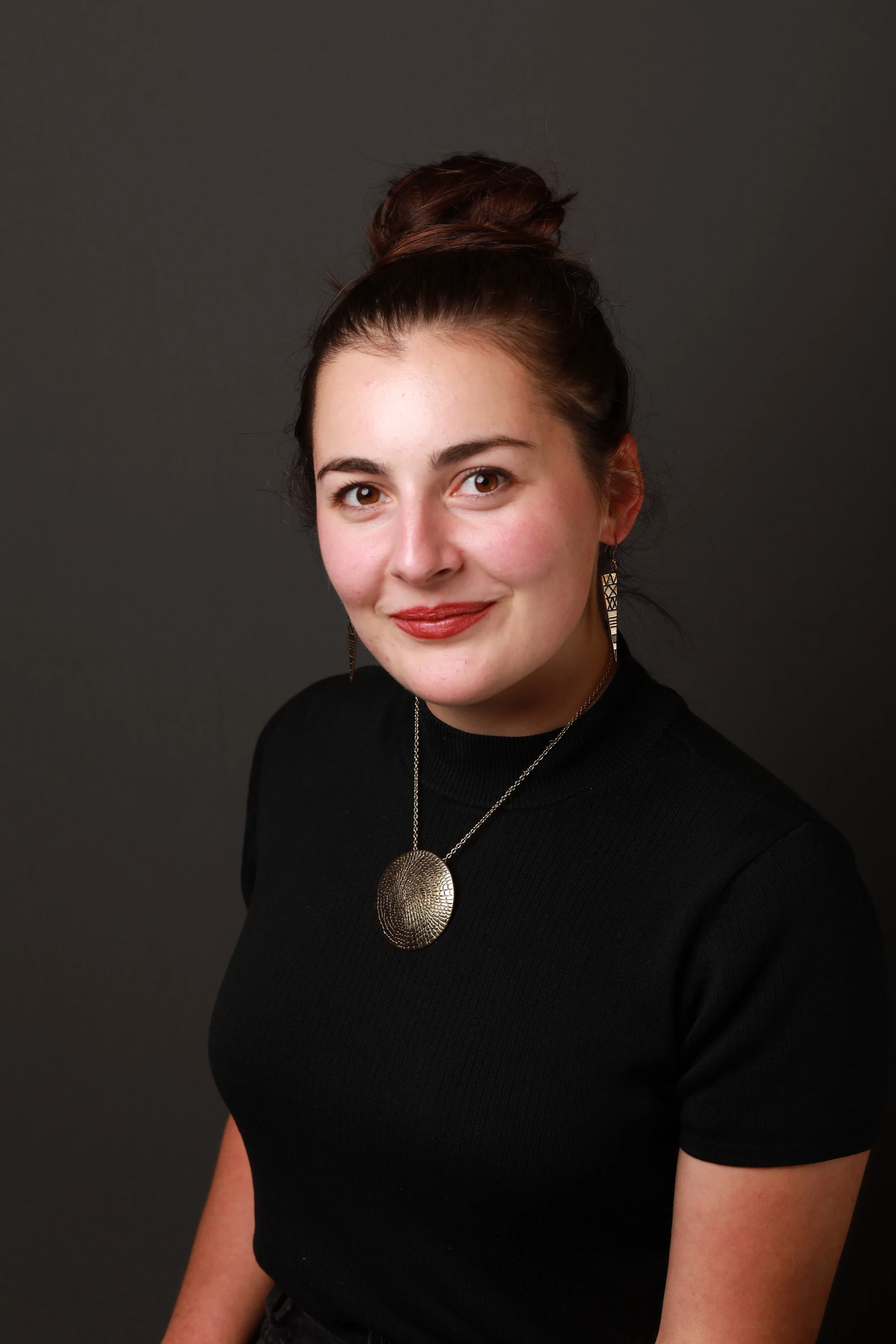 Consider hiring a professional hair artist to style your hair for your photo shoot