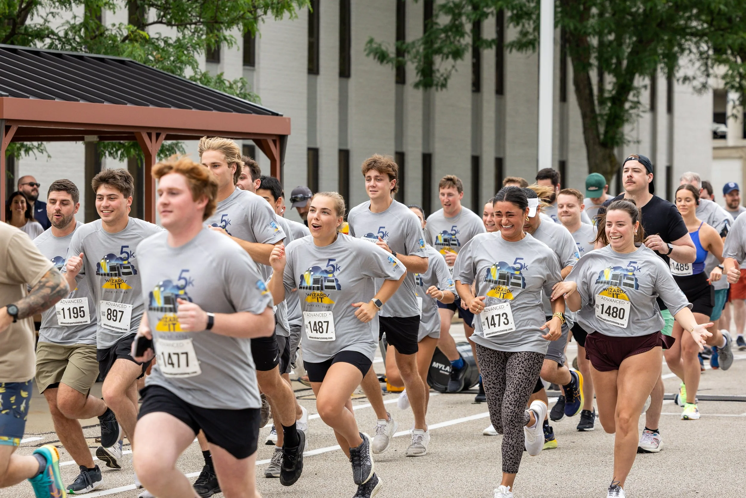 A group of runners race for fun during a corporate open house event in Northeast Ohio for Park Place Technologies