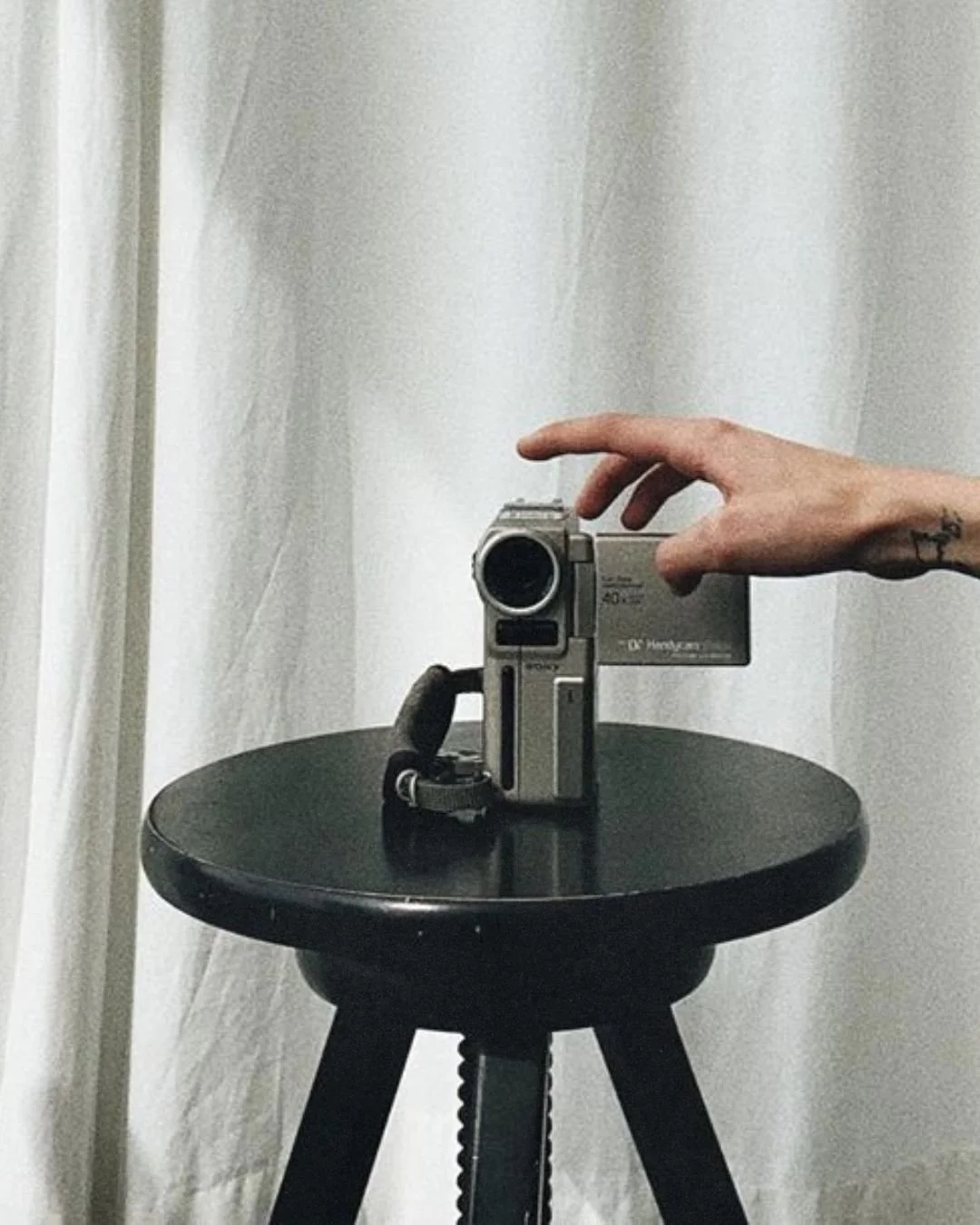 vintage 90's camcorder on a stool at a brand identity photoshoot