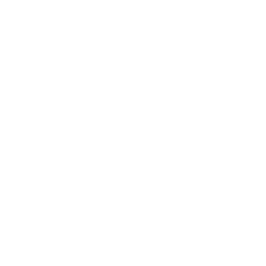 Photography studio setup with professional lighting, umbrella reflector, camera on tripod, and backdrop.