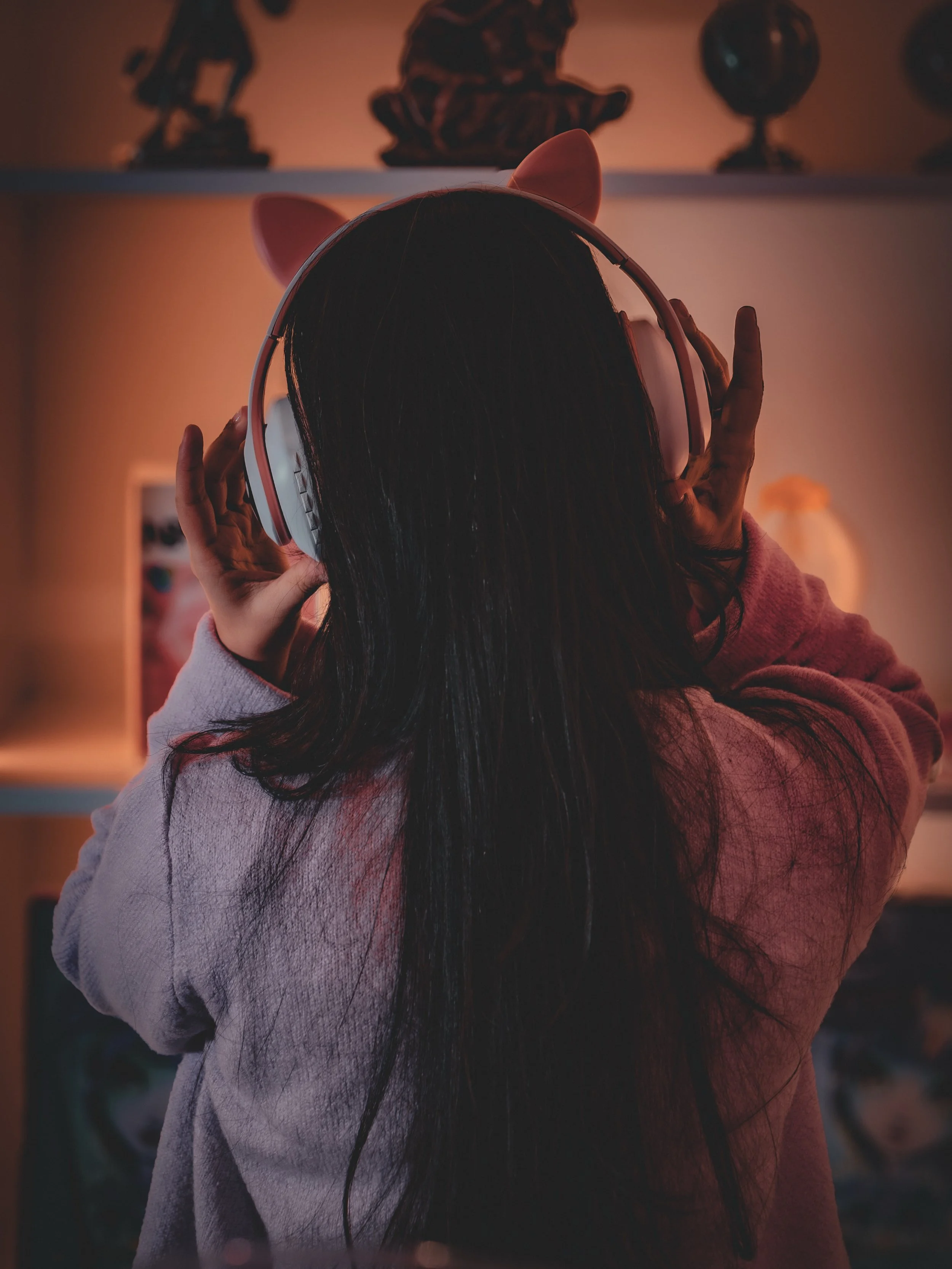Are you the kind of person who disappears into music with headphones on? 🎧✨

This felt like one of those quiet little moments that usually pass unnoticed. 
Selva standing there, completely inside her own world, with soft light filling the room and m