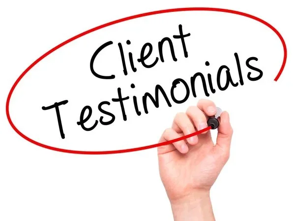 Hand writing "Client Testimonials" inside a red oval on a white background.