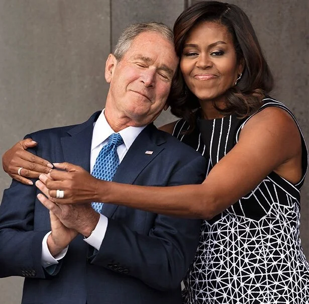 Image of Michelle Obama and George Bush photographed by David Kennerly.
