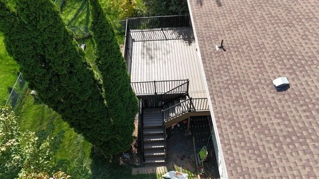 Woodbury, MN deck builder using black iron railing.jpeg