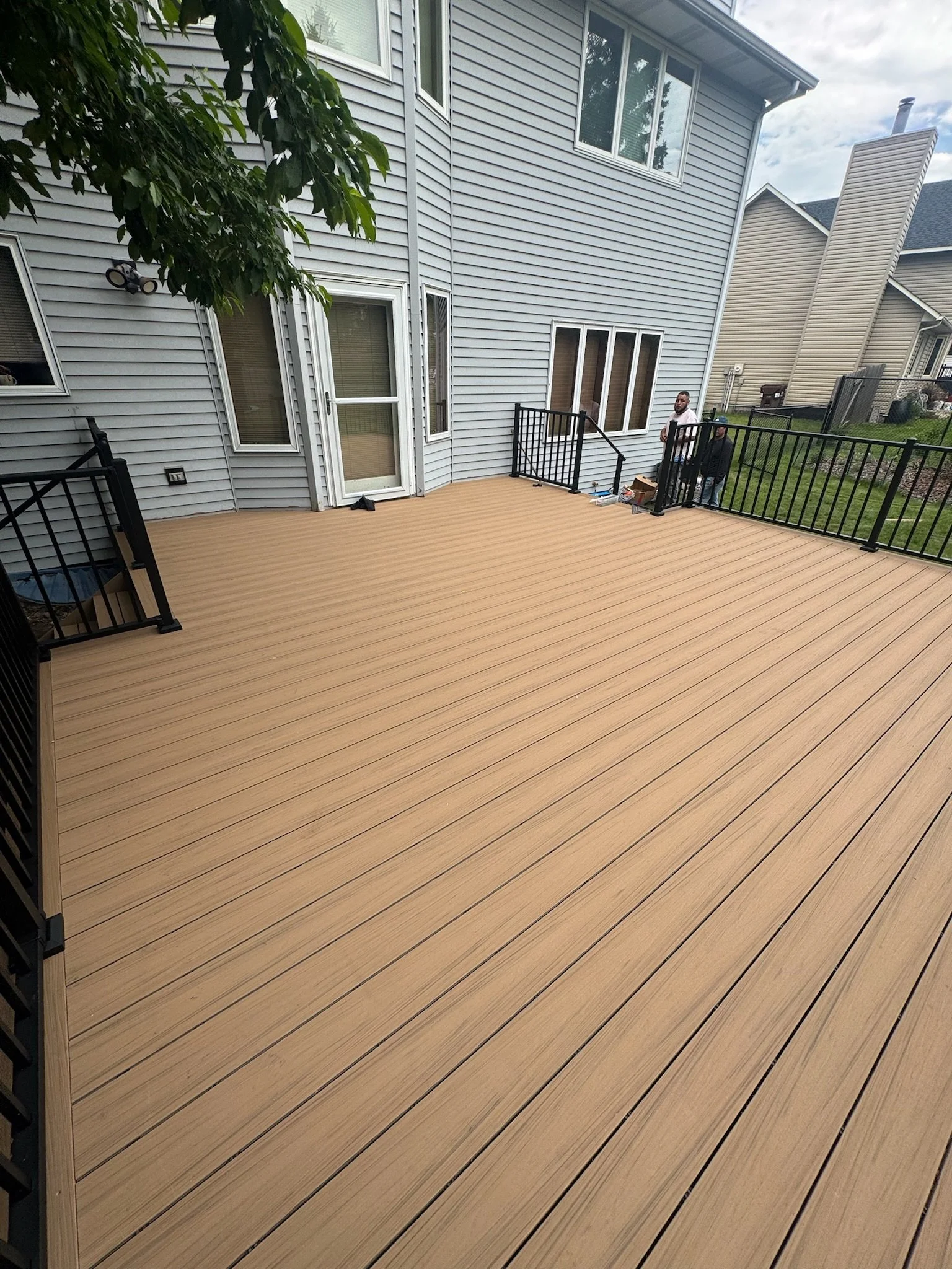 Trex deck landing and stair transition built by D2B Decks.JPG