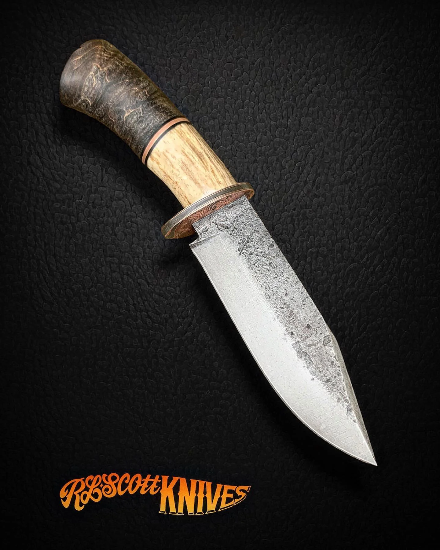 This one 👌

80CRV2 w/ Antler and Black Curly Maple, Copper and G10 spacers. 

Cross guard material : @bakerforgeandtool 
Handle material: @xoticblanks 
.
.
.
.
.
.
#jewelrygram #edccommunity #weldernation #fabrication #handcrafted #workshop #everyda