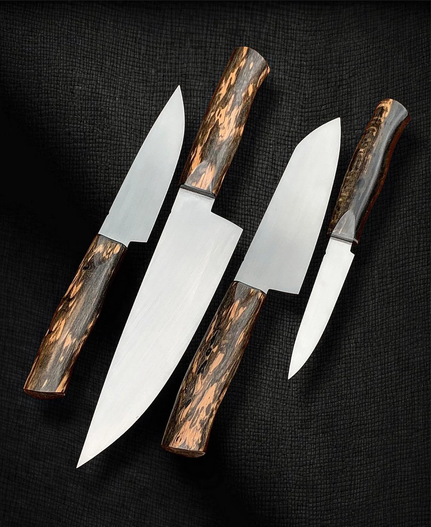 All the essentials&hellip; 
AEB-L w/ Black and White Ebony. 
8&rdquo; Chef
6&rdquo; Santoku 
6&rdquo; Utility 
4&rdquo; Paring 

#Sold

Handle material from @xoticblanks 🔥🔥
.
.
.
.
.
 

#madeinusa #chef #handmade #chefknife #chef #gyuto #santoku #c