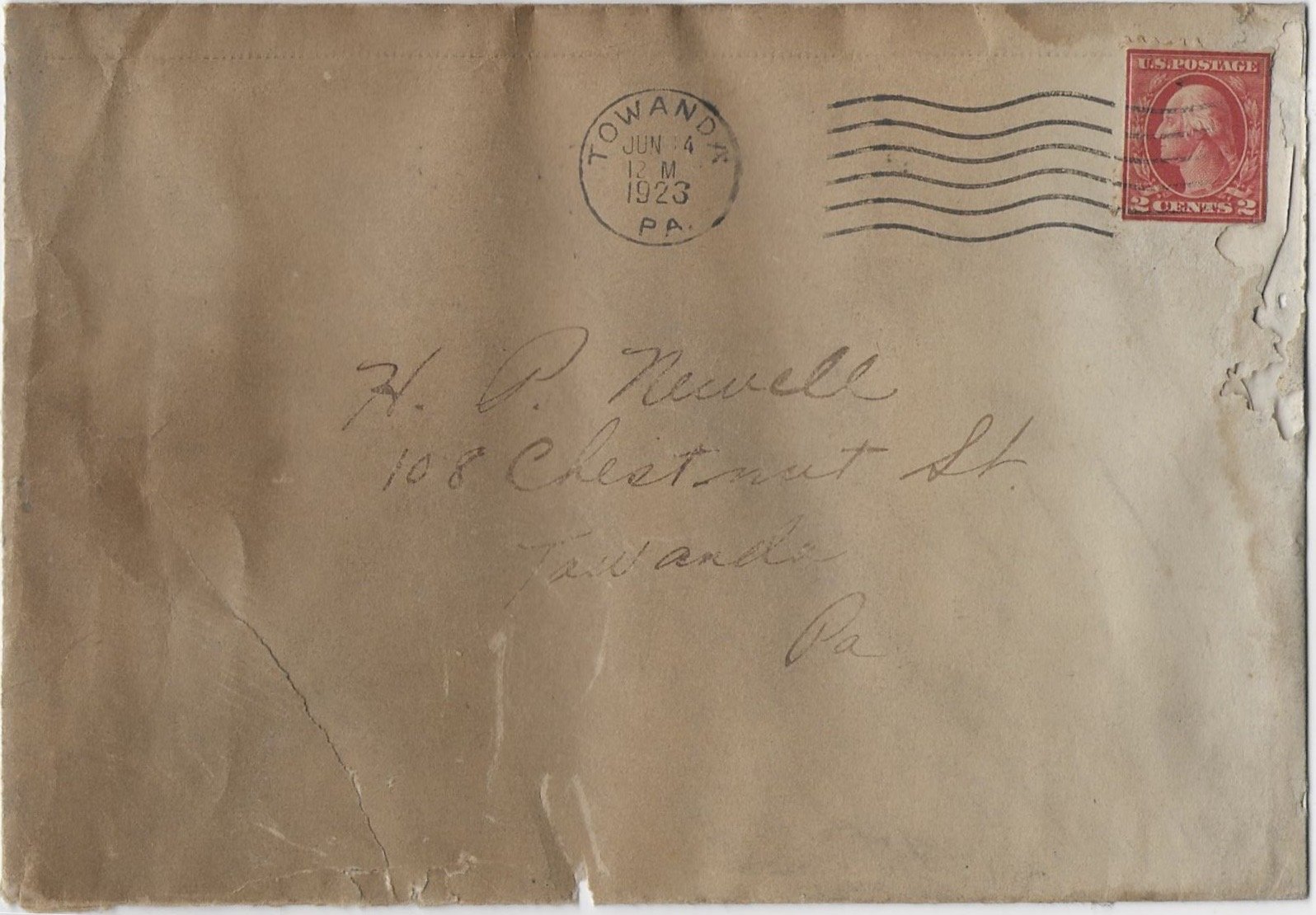 This envelope, postmarked June 1923, was also found behind the fireplace mantel in the library. It contained an end-of-year report card for Henry Jr from the Towanda High School.