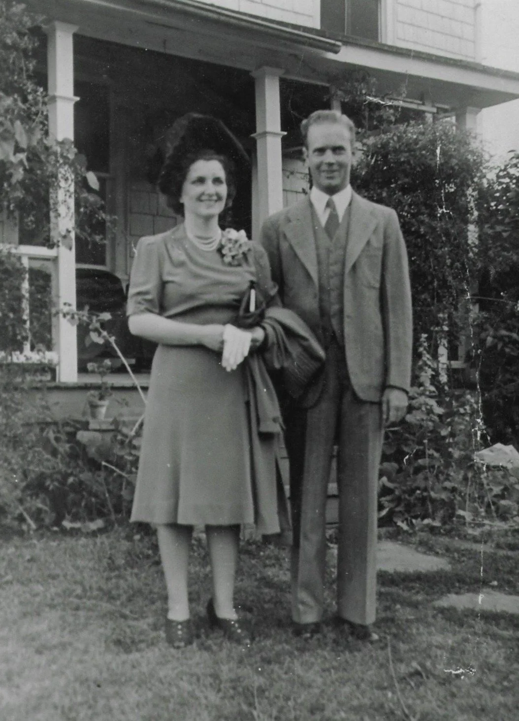 Francis Mitten "Bob" Archer and Mary Nash Sullivan on their wedding day, 9 August 1941. Bob and Mary bought the house in March 1950 and used it as a funeral home. They lived here with their two children, Bobby and Mary Ellen. Photograph courtesy of M
