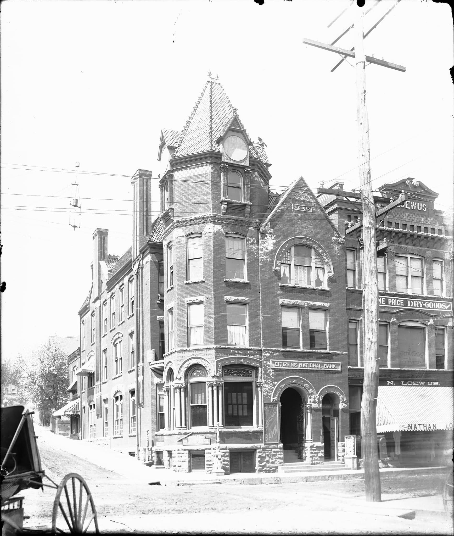 Photograph of the Citizens National Bank, corner of Bridge & Main Streets, where Henry was the cashier. His granddaughter, Mary Gail Miller, told us that Henry never learned to drive an automobile, but had a horse who would take him to and from the b