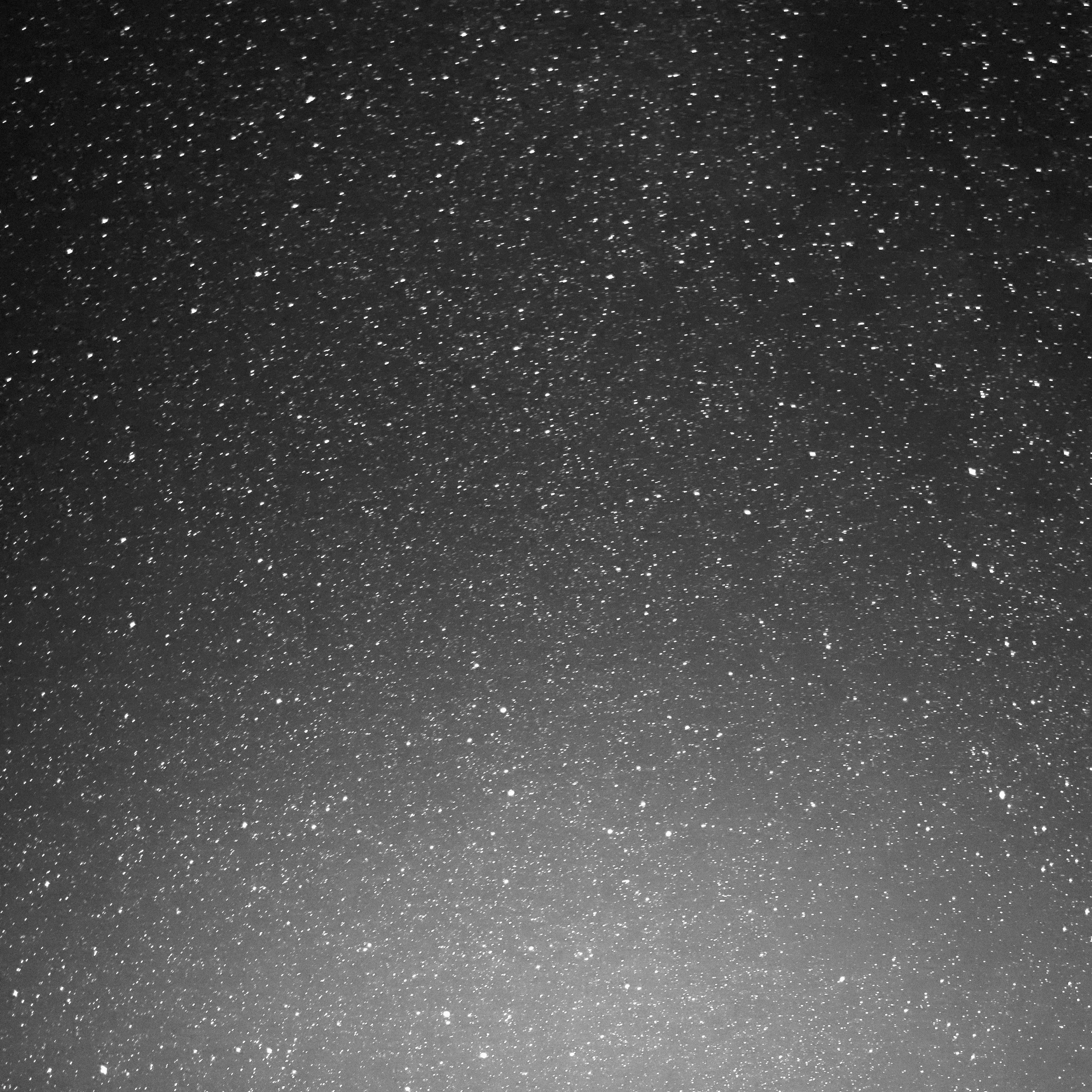 Starry night sky with numerous visible stars across the sky.