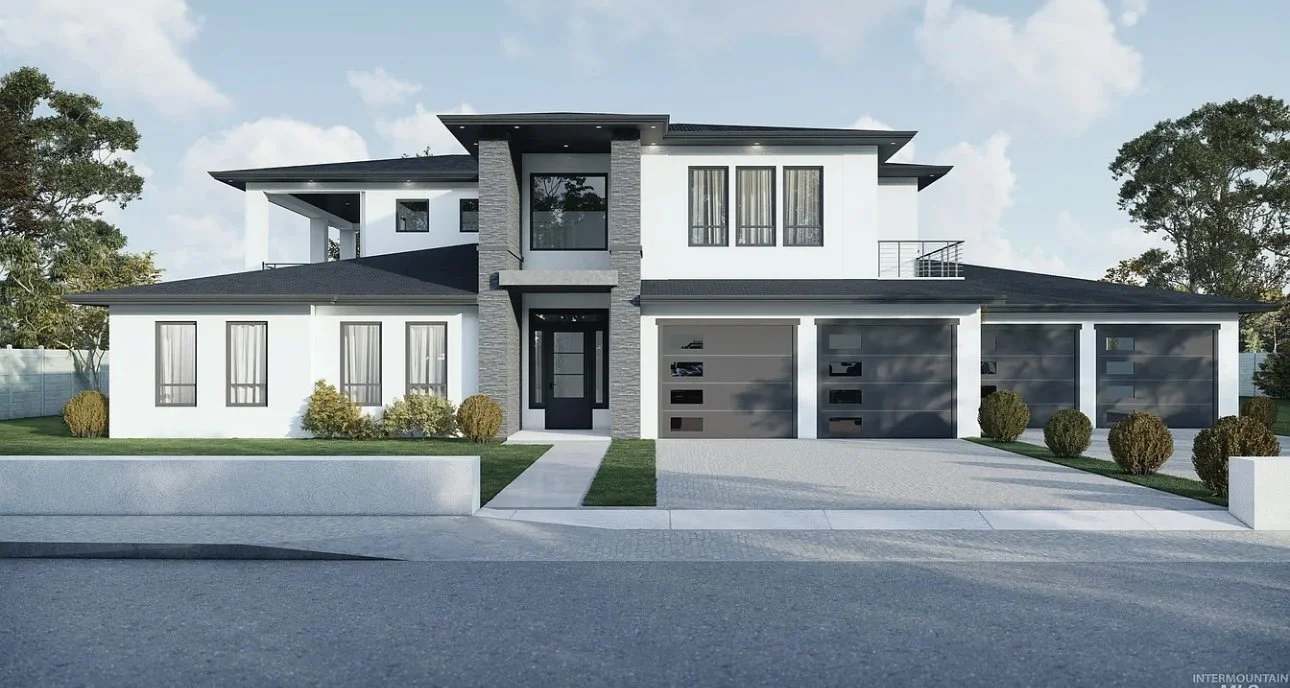 Modern two-story house with white exterior, dark roof, and three garage doors, surrounded by small bushes and trees under a cloudy sky.