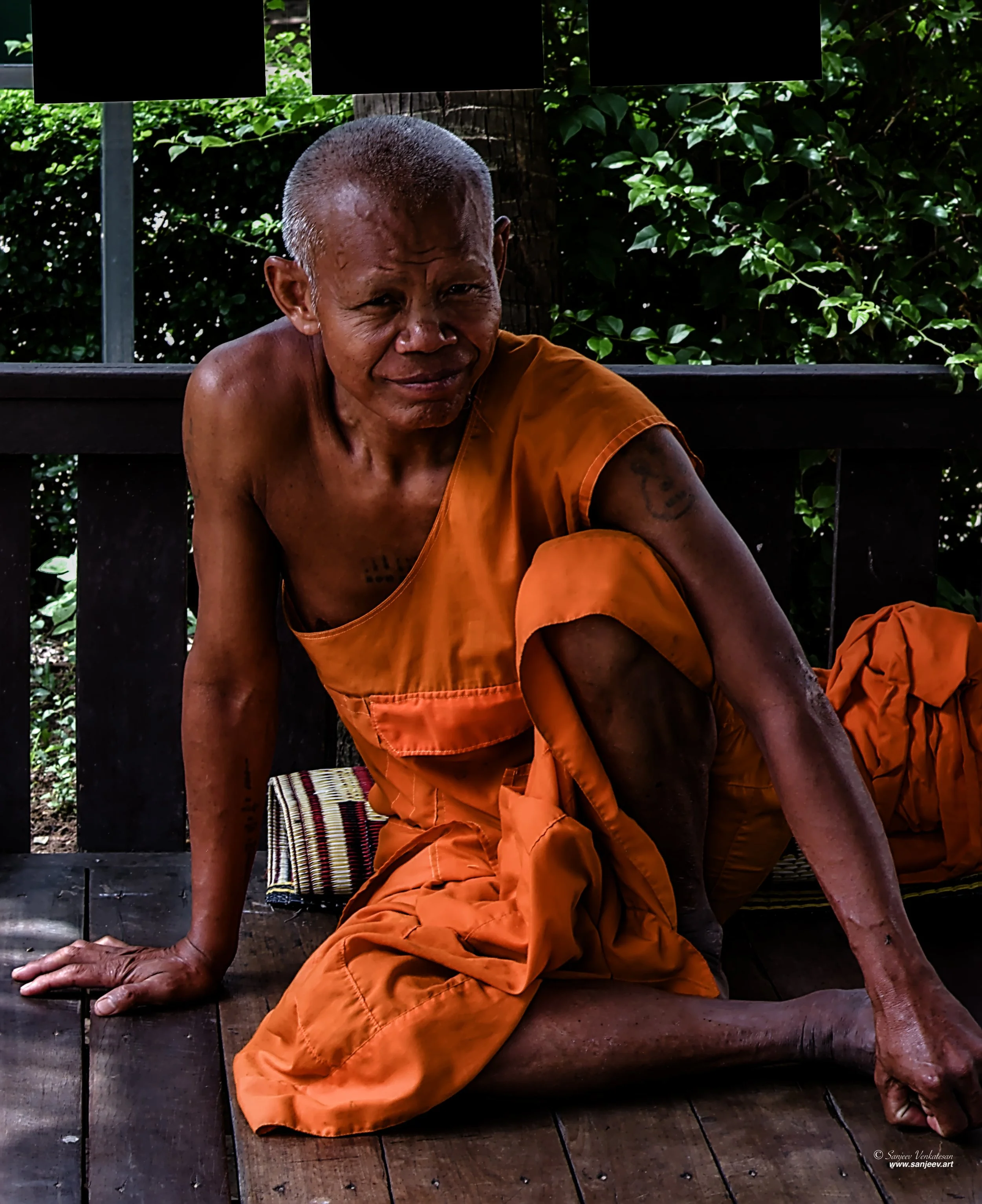Angkor Monk Sitting.jpg