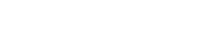 A stark white background with a small, black, upside-down triangle centered near the top.