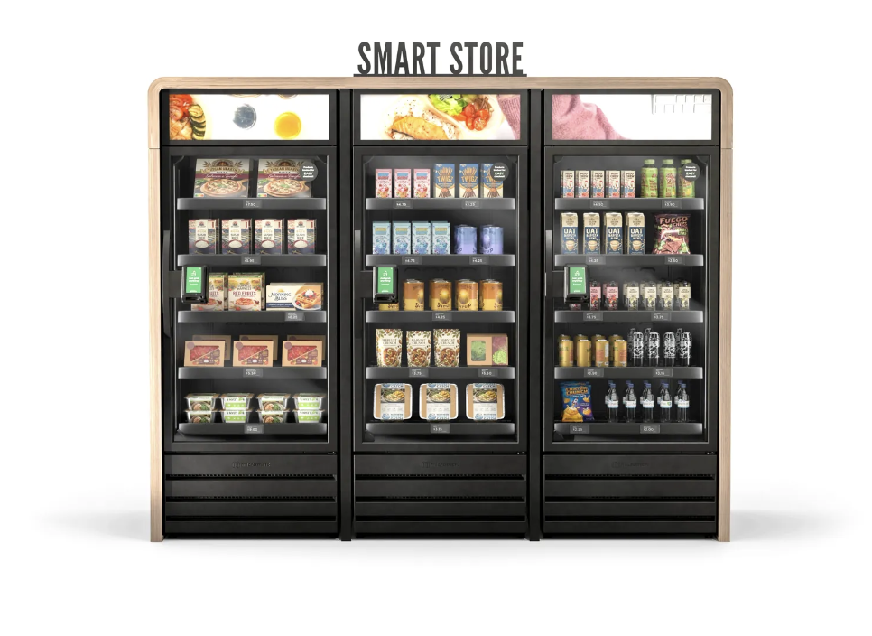 A smart store vending machine with three sections, stocked with various food and beverage items, labeled 'Smart Store' at the top.