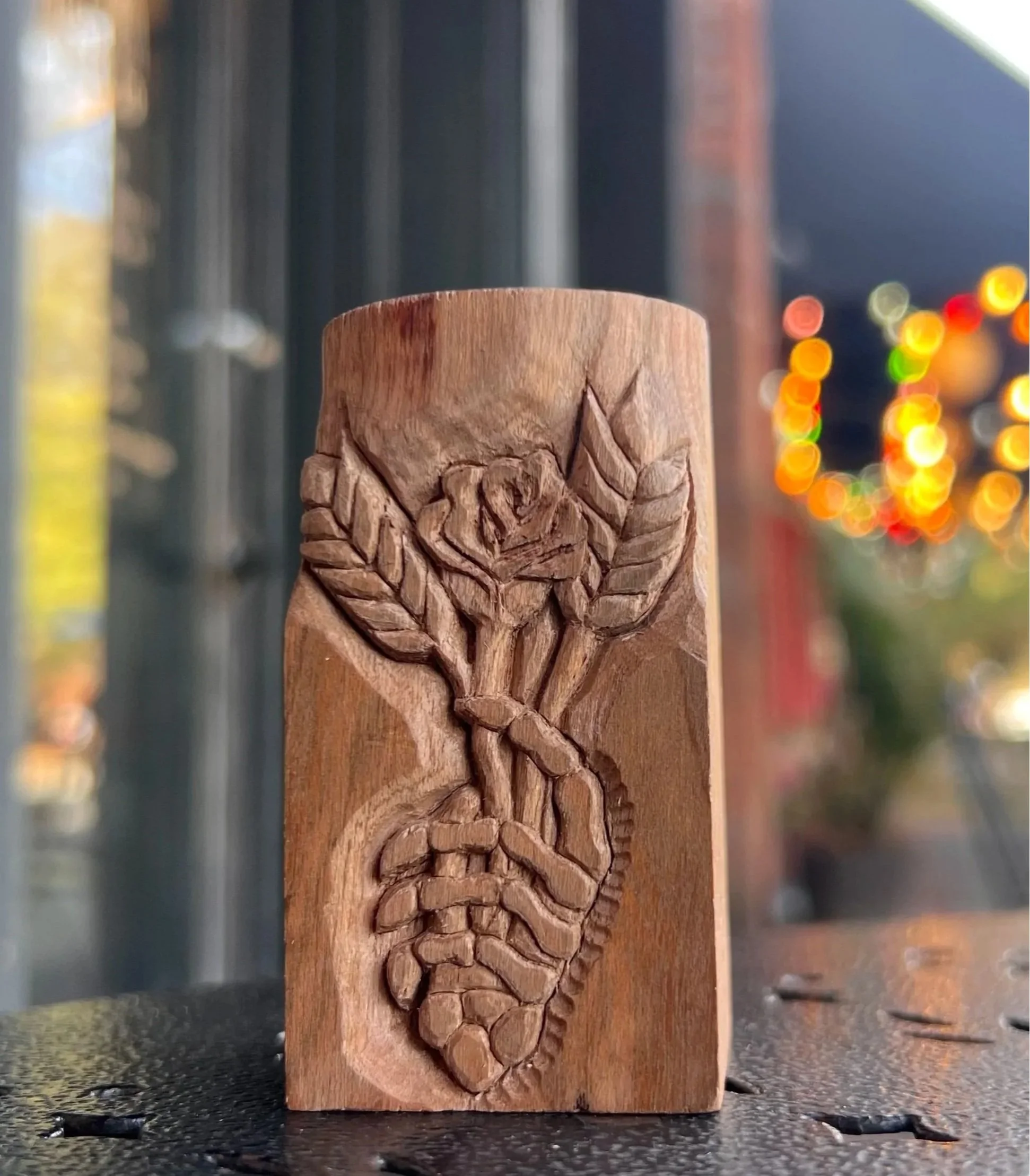 "From Birth Until Life Closes" Hand carved dried flower vase, unfinished, scrap wood. Bread and Roses series, relief carved motif. 