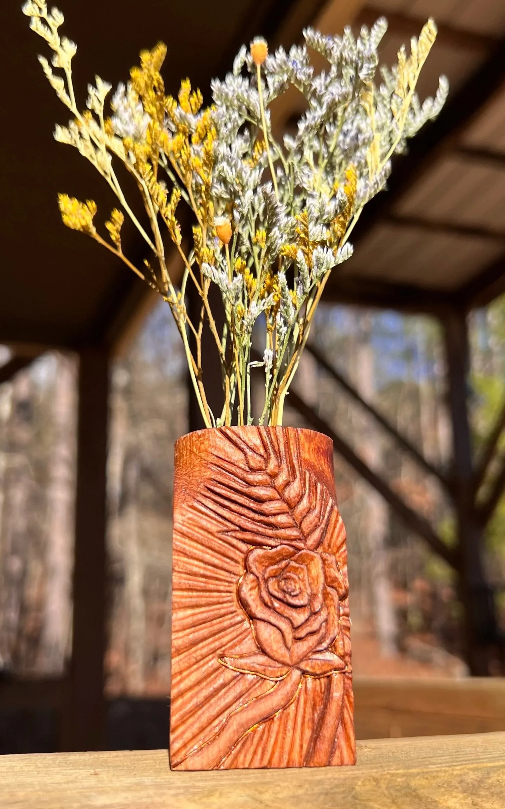 "Bread and Roses" Hand carved dried flower vase, unfinished, scrap wood and metal inlay. Bread and Roses series, relief carved motif.