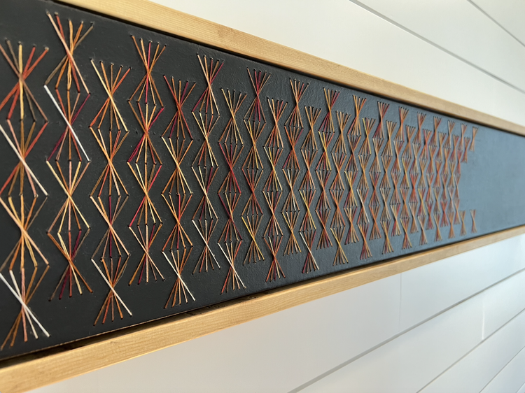 DMC Embroidery Floss. Varnished 2x4 custom frame.