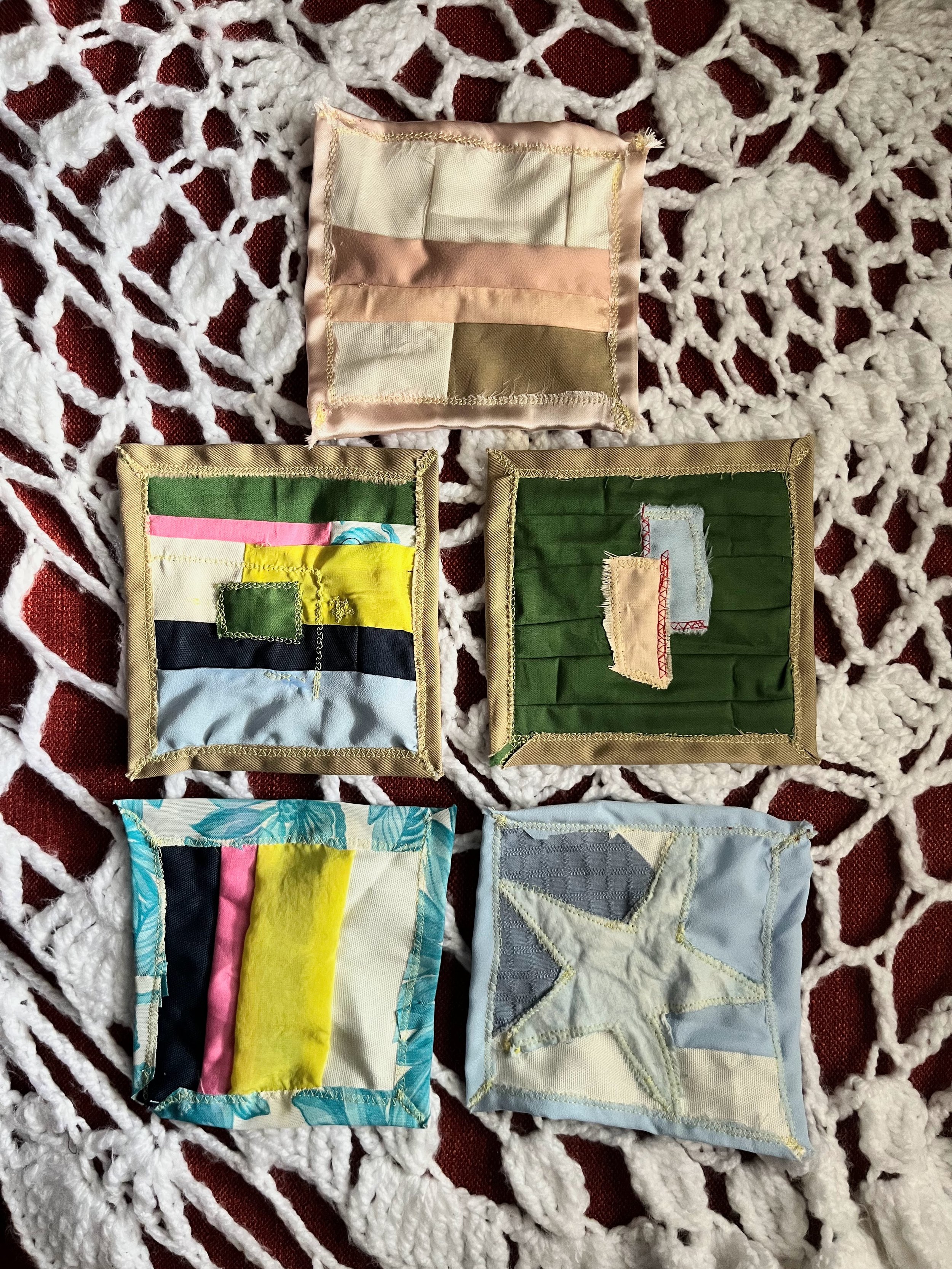 Mini quilts, 2022. Machine sewn fabric scraps. 6 x 6 in.