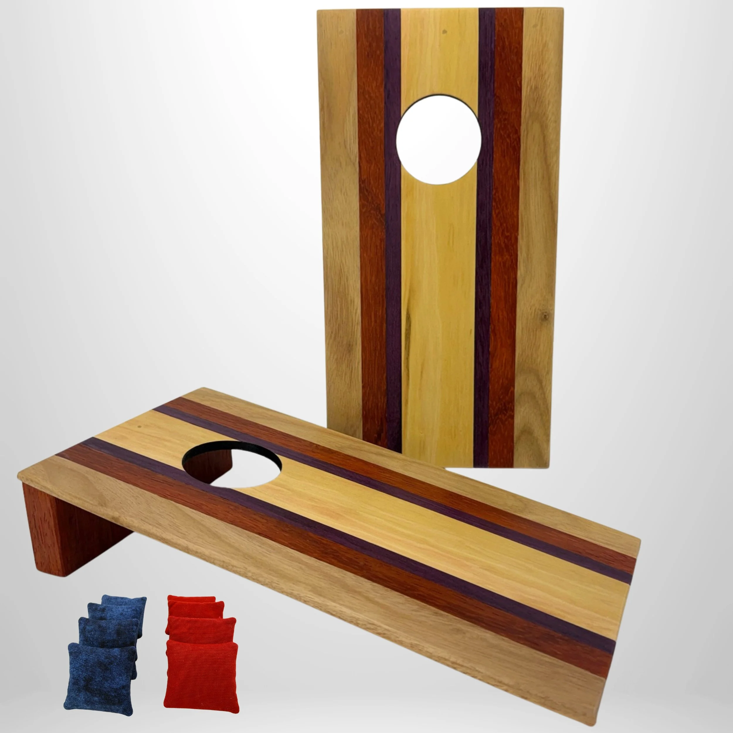 Handcrafted tabletop mini cornhole boards made from solid hardwood, Cherry wood border with exotic hardwoods such as canary, Purple Heart, and padouk