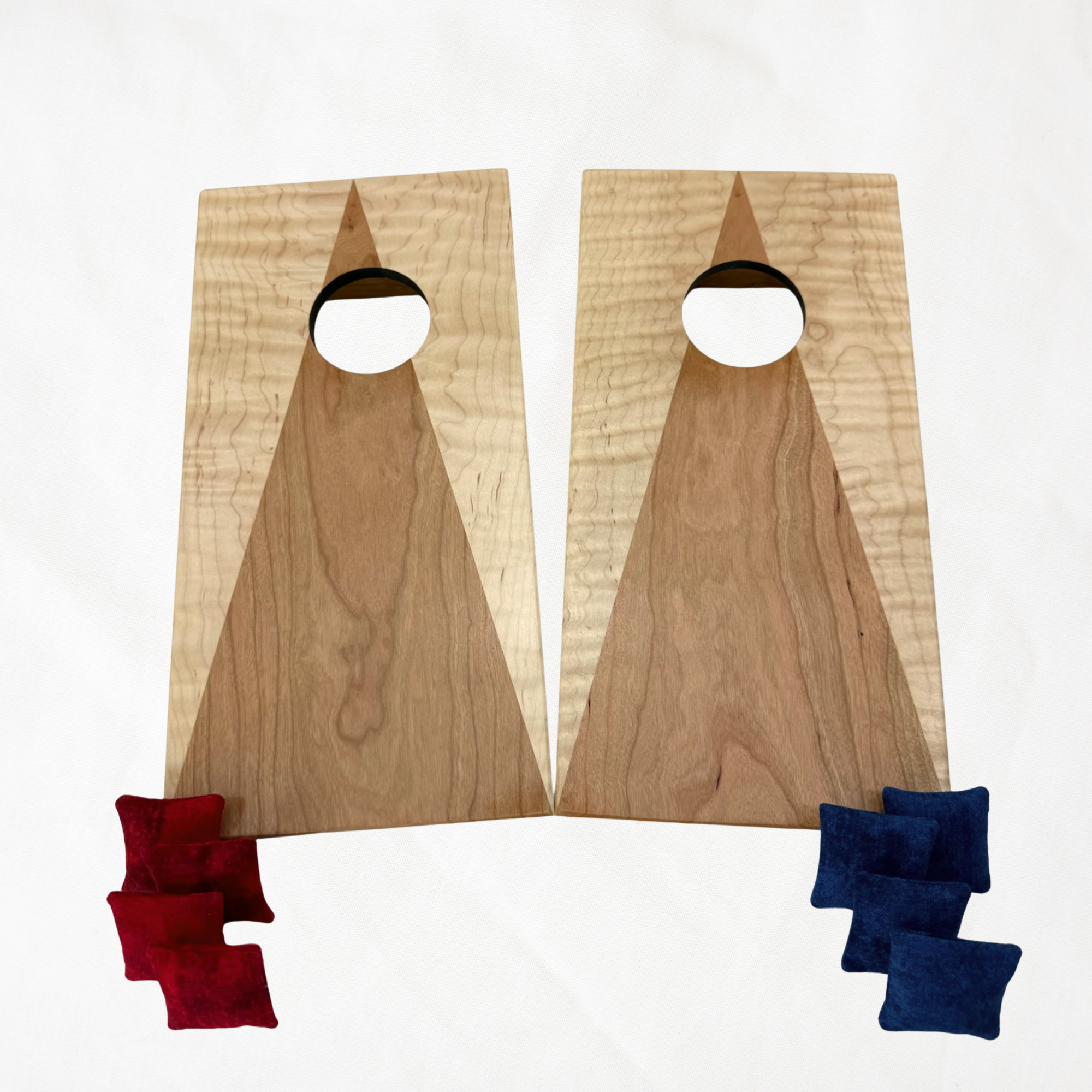 Handcrafted tabletop mini cornhole boards made from solid hardwood, two-tone curly maple and cherry wood