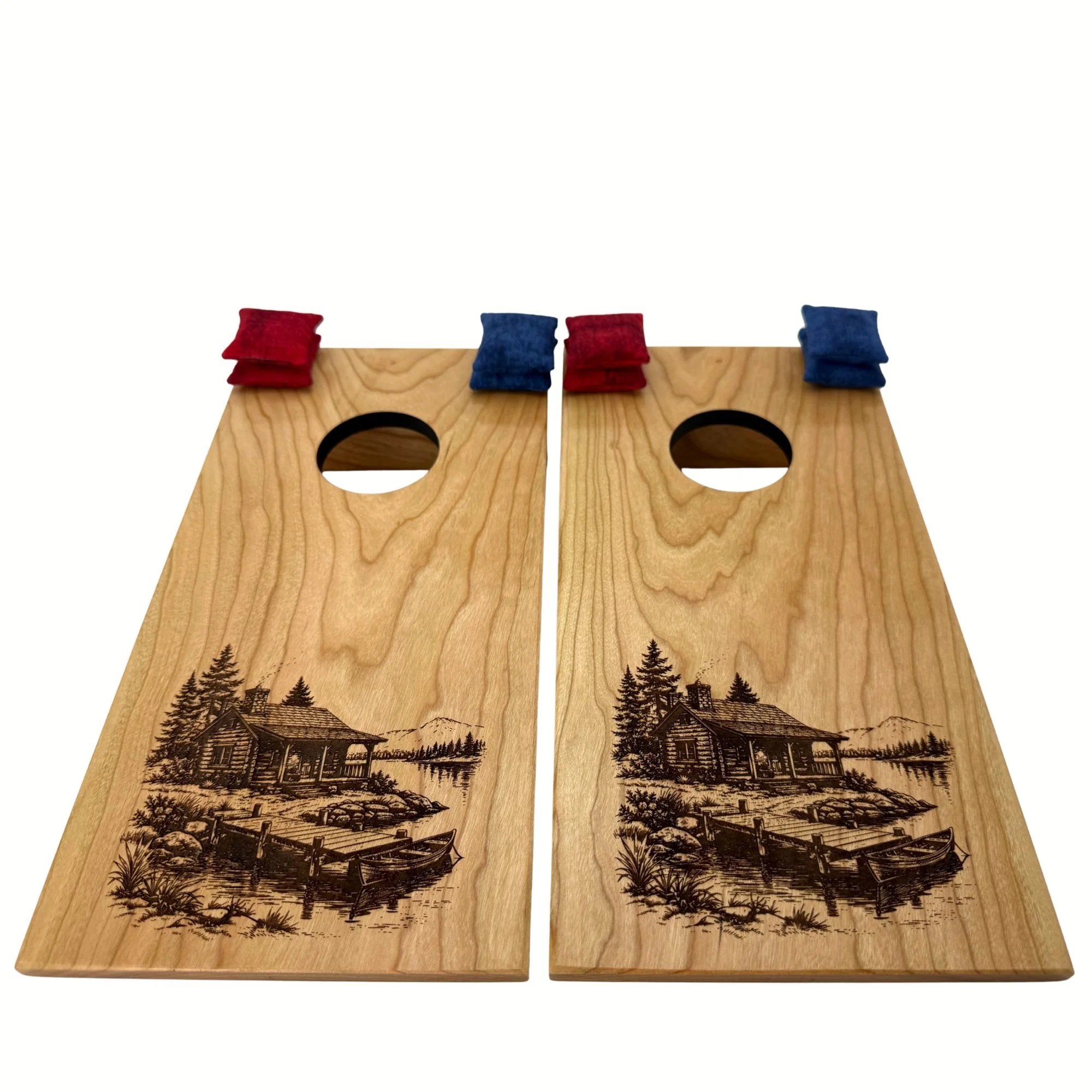 Handcrafted tabletop mini cornhole boards made from solid hardwood, cherry wood, and engraved with a cabin