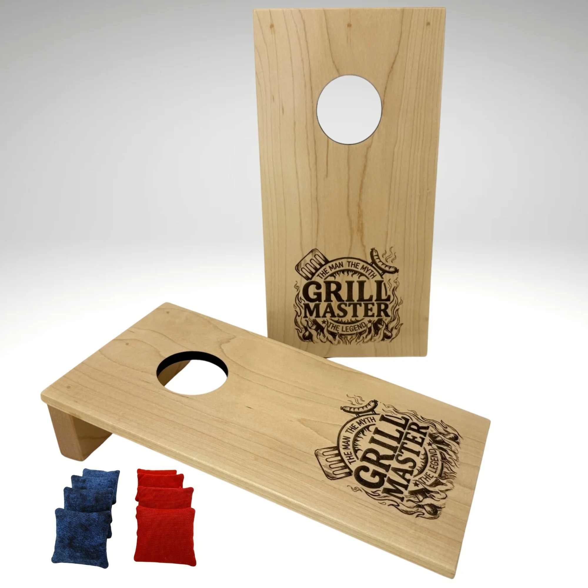Handcrafted tabletop mini cornhole boards made from solid hardwood, maple wood, and engraved with grill master
