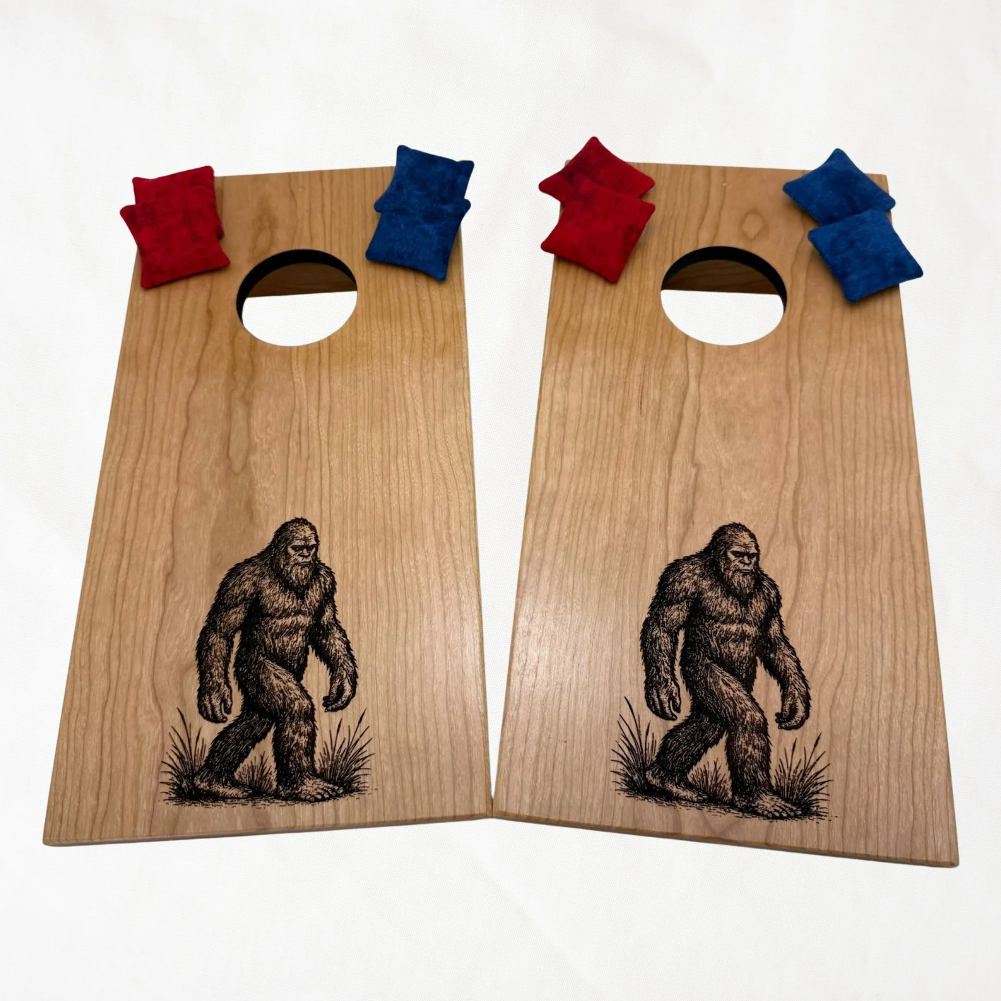 Handcrafted tabletop mini cornhole boards made from solid hardwood, cherry wood, engraved with Bigfoot