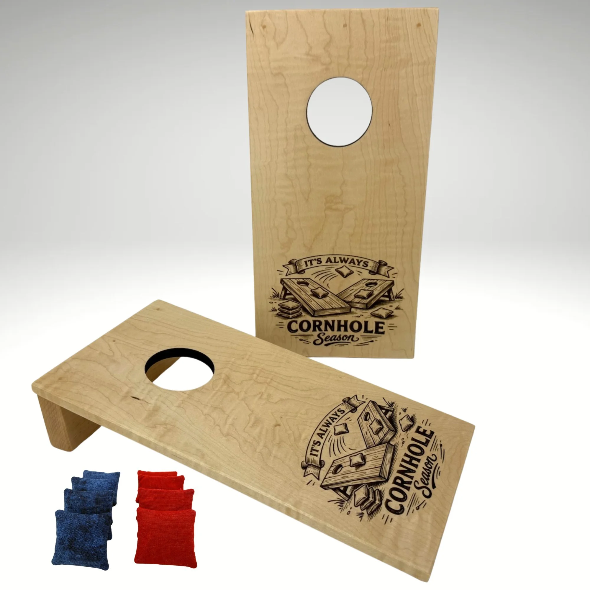 Handcrafted tabletop mini cornhole boards made from solid hardwood, maple wood, and engraved with cornhole season