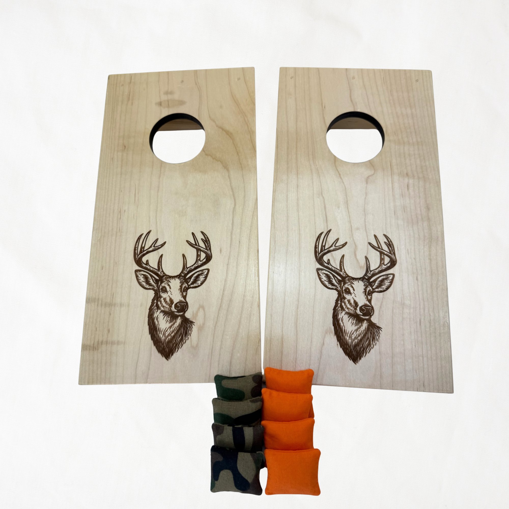 Handcrafted tabletop mini cornhole boards made from solid hardwood, maple wood, engraved with deer